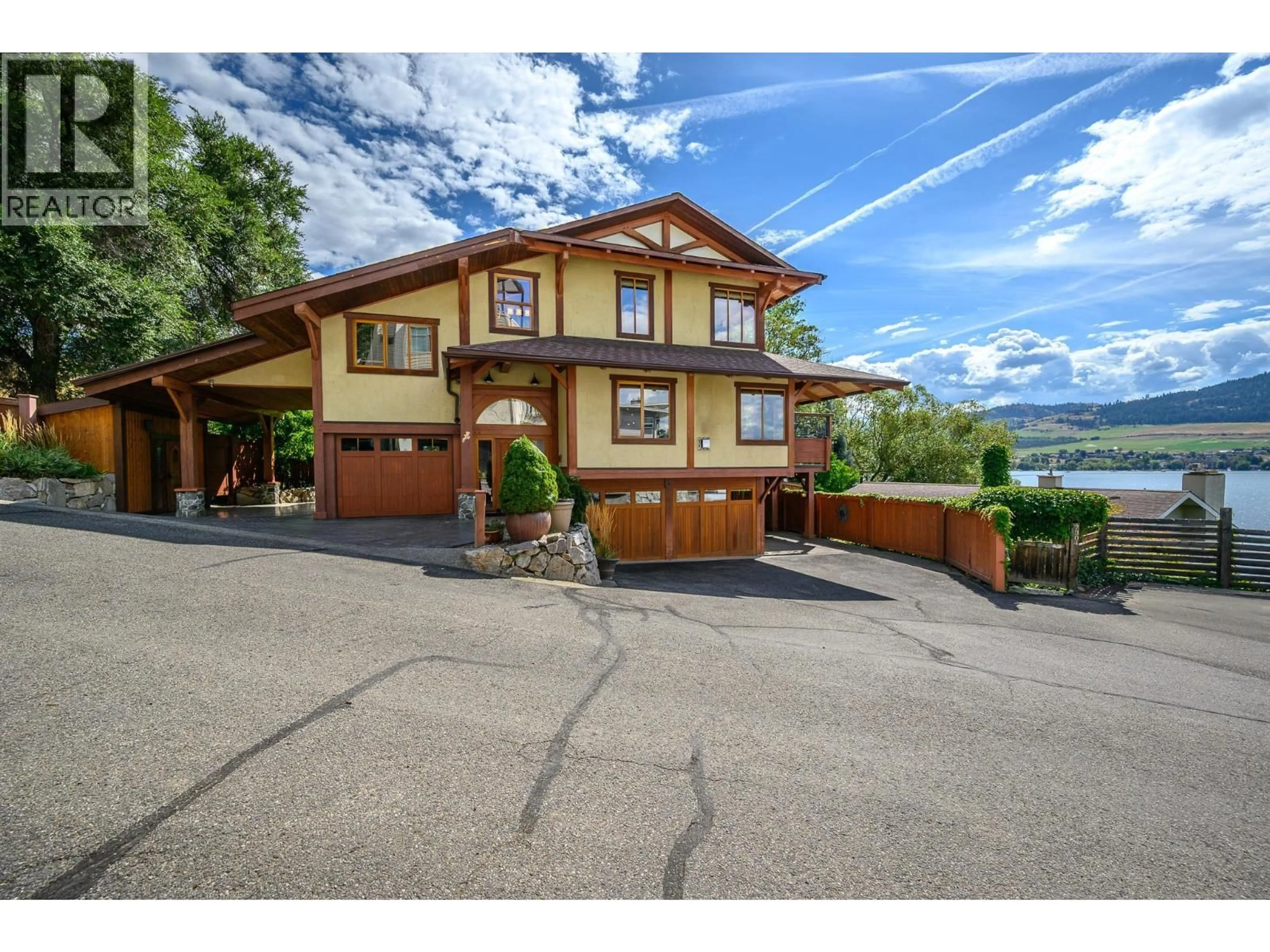 A pic from outside/outdoor area/front of a property/back of a property/a pic from drone, water/lake/river/ocean view for 7302 OLD STAMP MILL ROAD, Vernon British Columbia V1H1N2