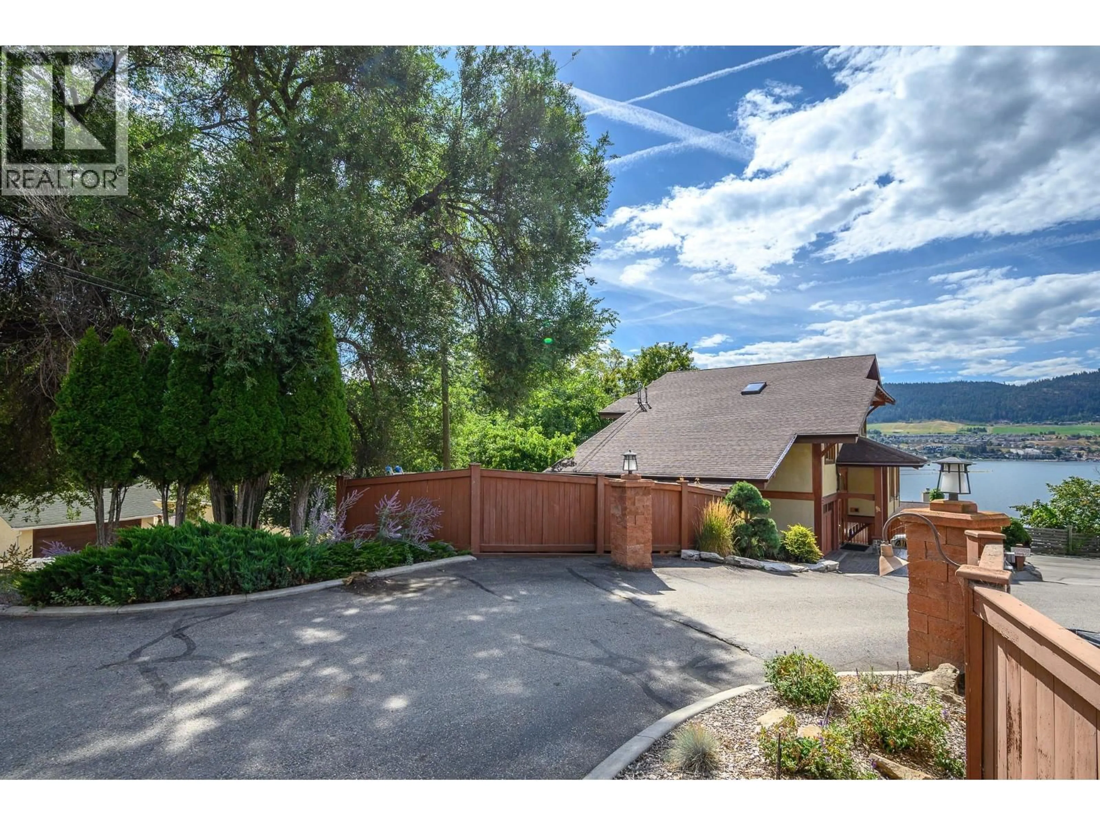 A pic from outside/outdoor area/front of a property/back of a property/a pic from drone, mountain view for 7302 OLD STAMP MILL ROAD, Vernon British Columbia V1H1N2