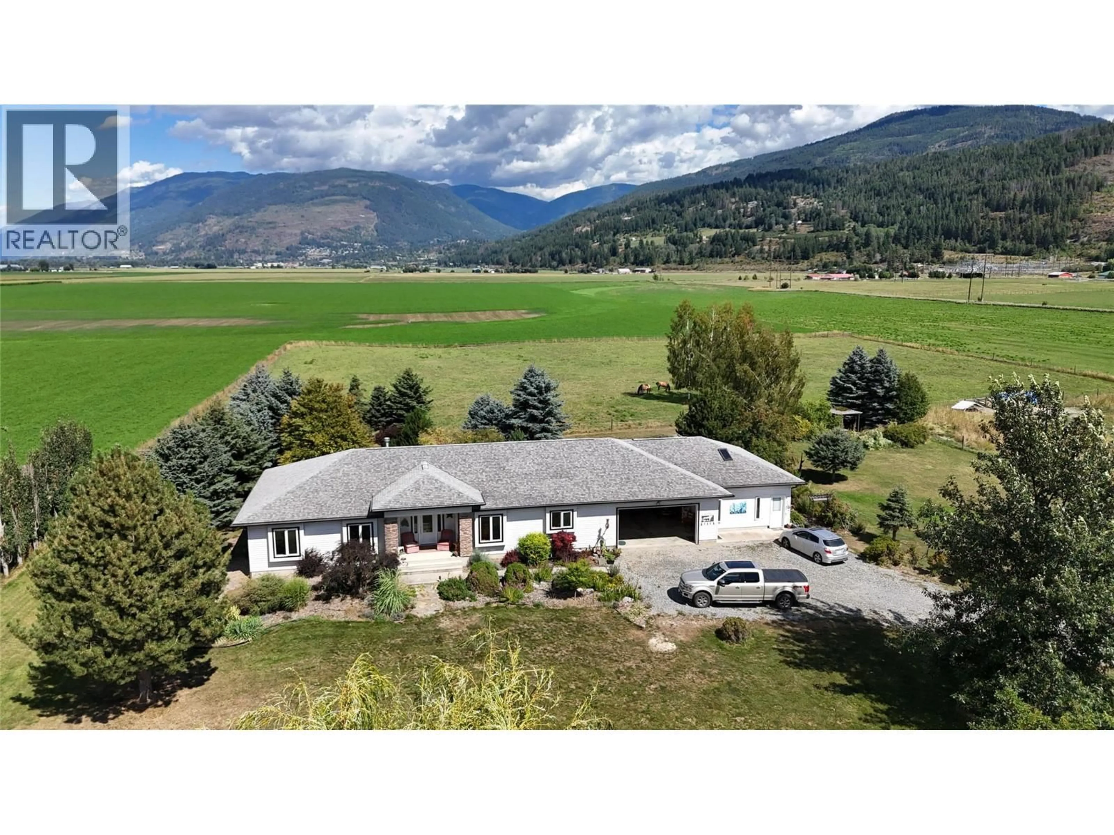 A pic from outside/outdoor area/front of a property/back of a property/a pic from drone, mountain view for 710 INDIAN ROAD, Creston British Columbia V0B1G8