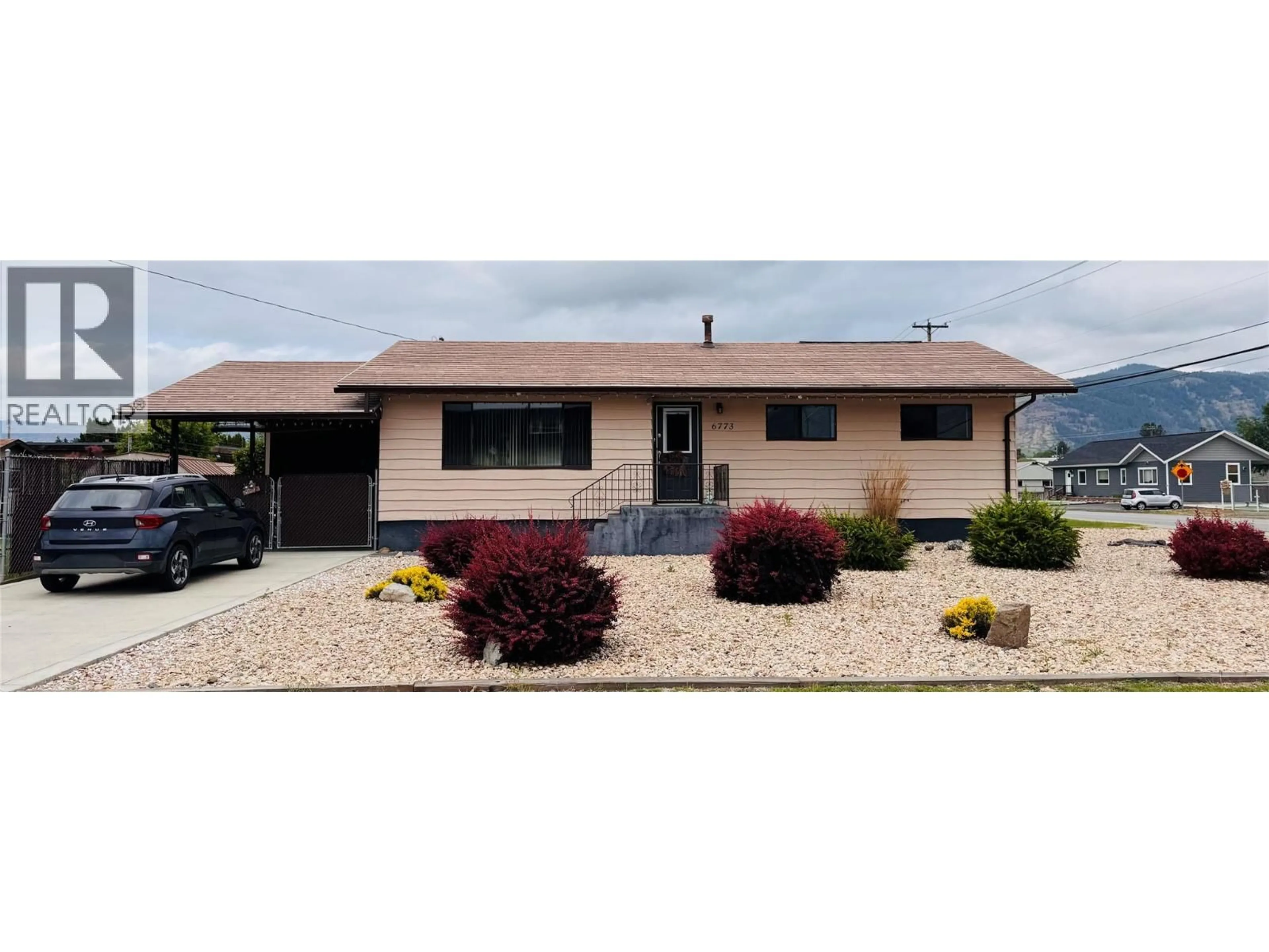 Home with vinyl exterior material, street for 6773 14TH STREET, Grand Forks British Columbia V0H1H0