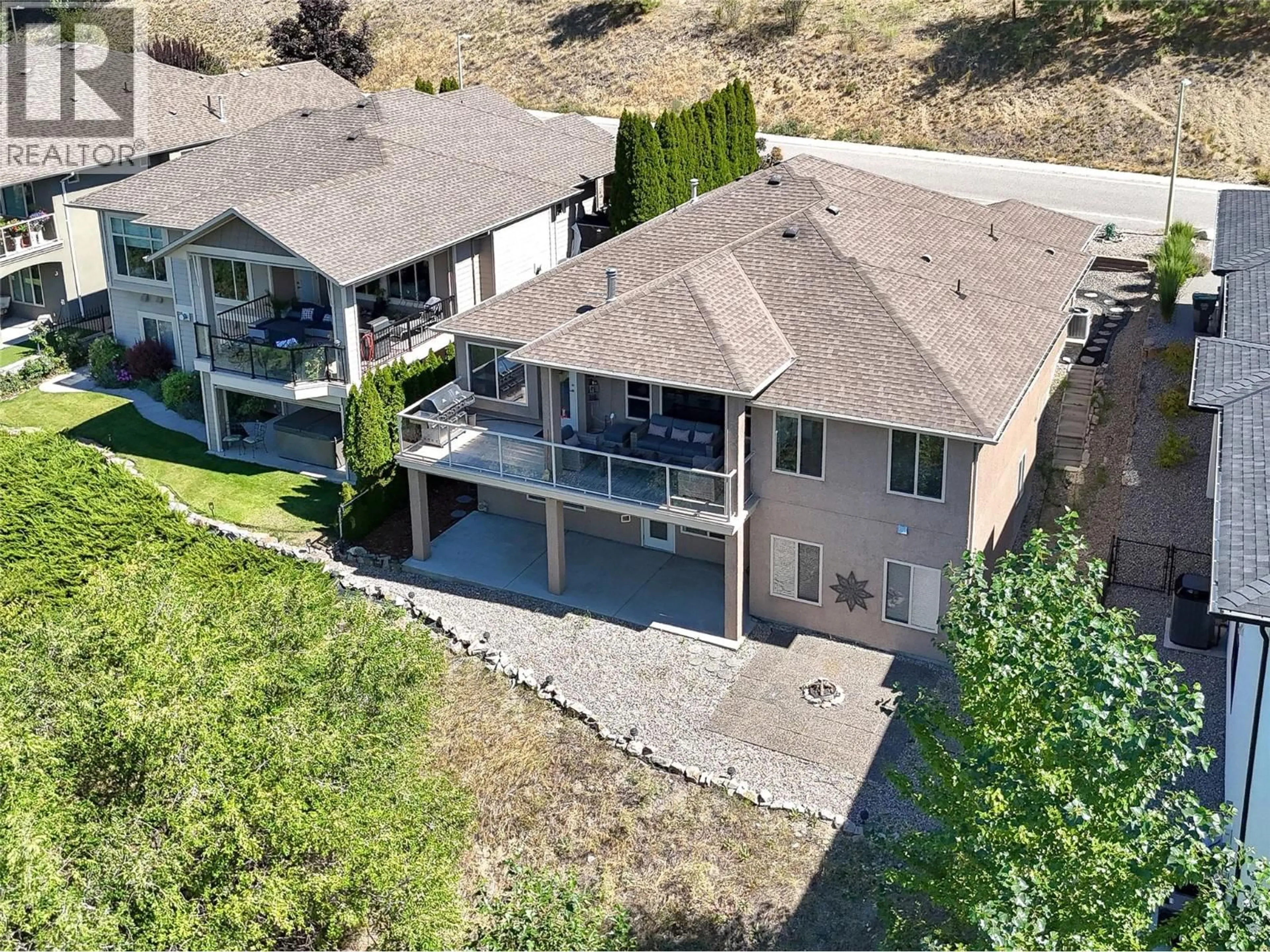A pic from outside/outdoor area/front of a property/back of a property/a pic from drone, water/lake/river/ocean view for 600 DENALI DRIVE, Kelowna British Columbia V1V2P6