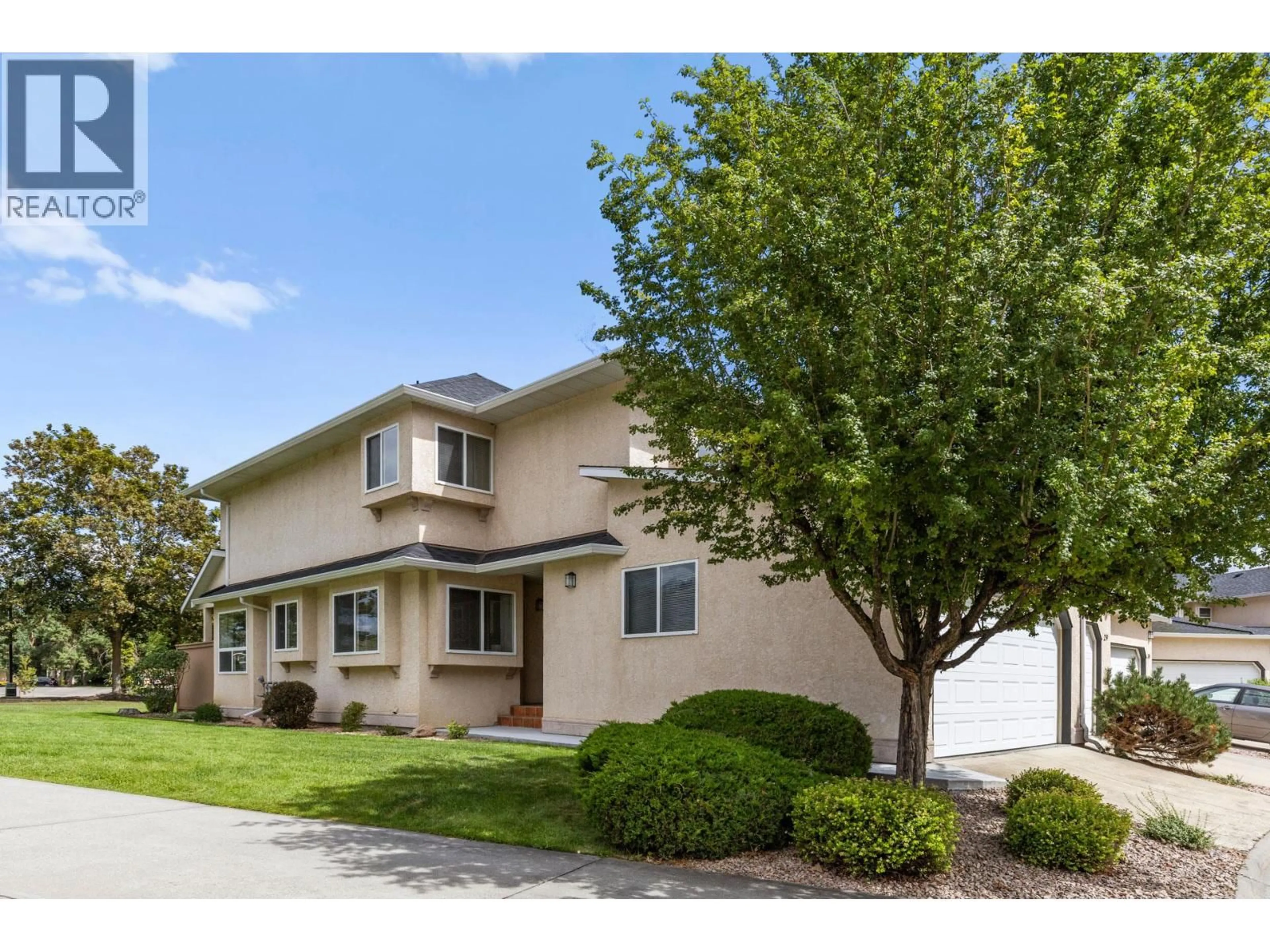 Home with vinyl exterior material, street for 28 - 313 WHITMAN ROAD, Kelowna British Columbia V1V2J4
