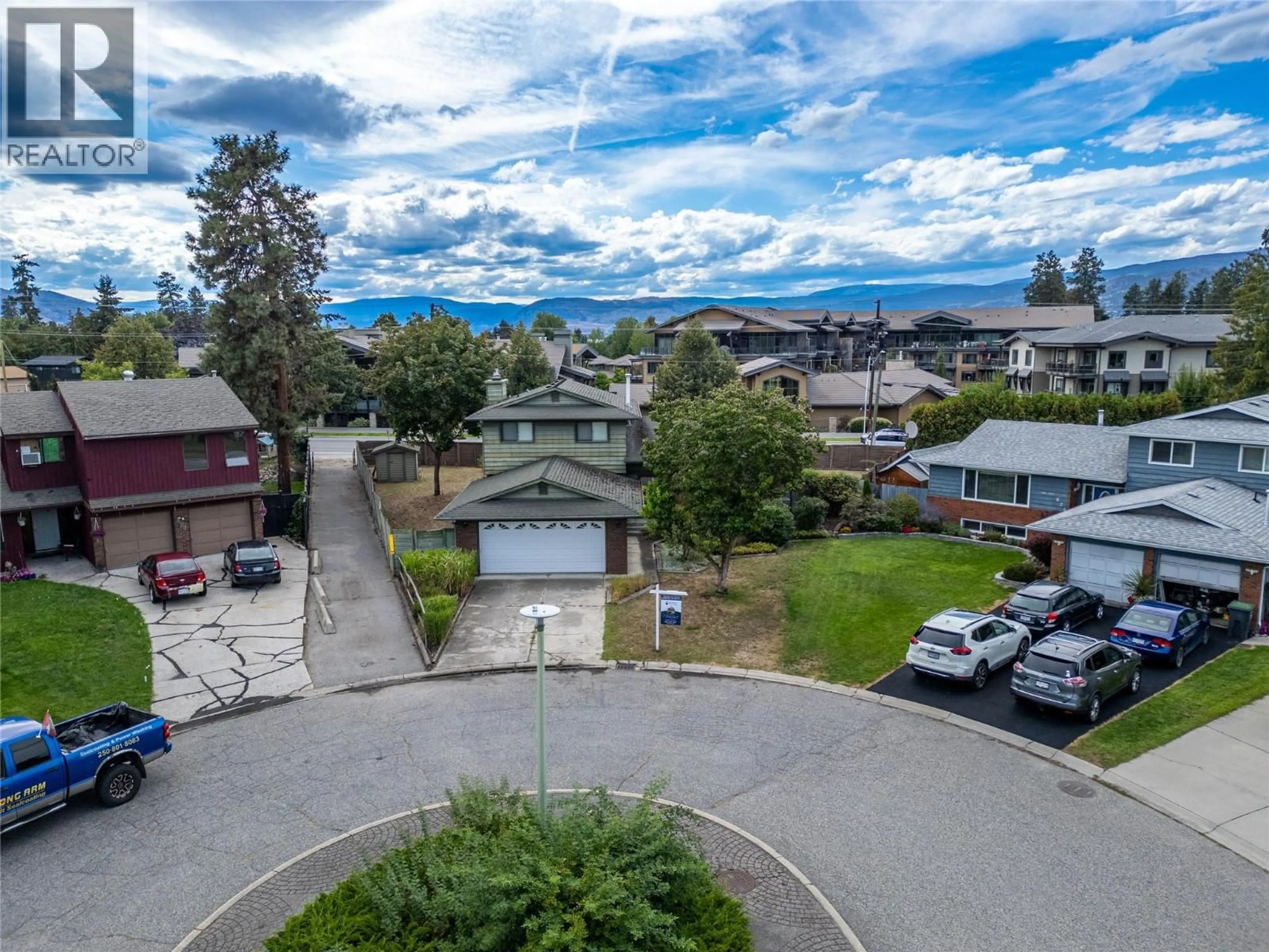 A pic from outside/outdoor area/front of a property/back of a property/a pic from drone, mountain view for 620 TOMBY COURT, Kelowna British Columbia V1W2K9