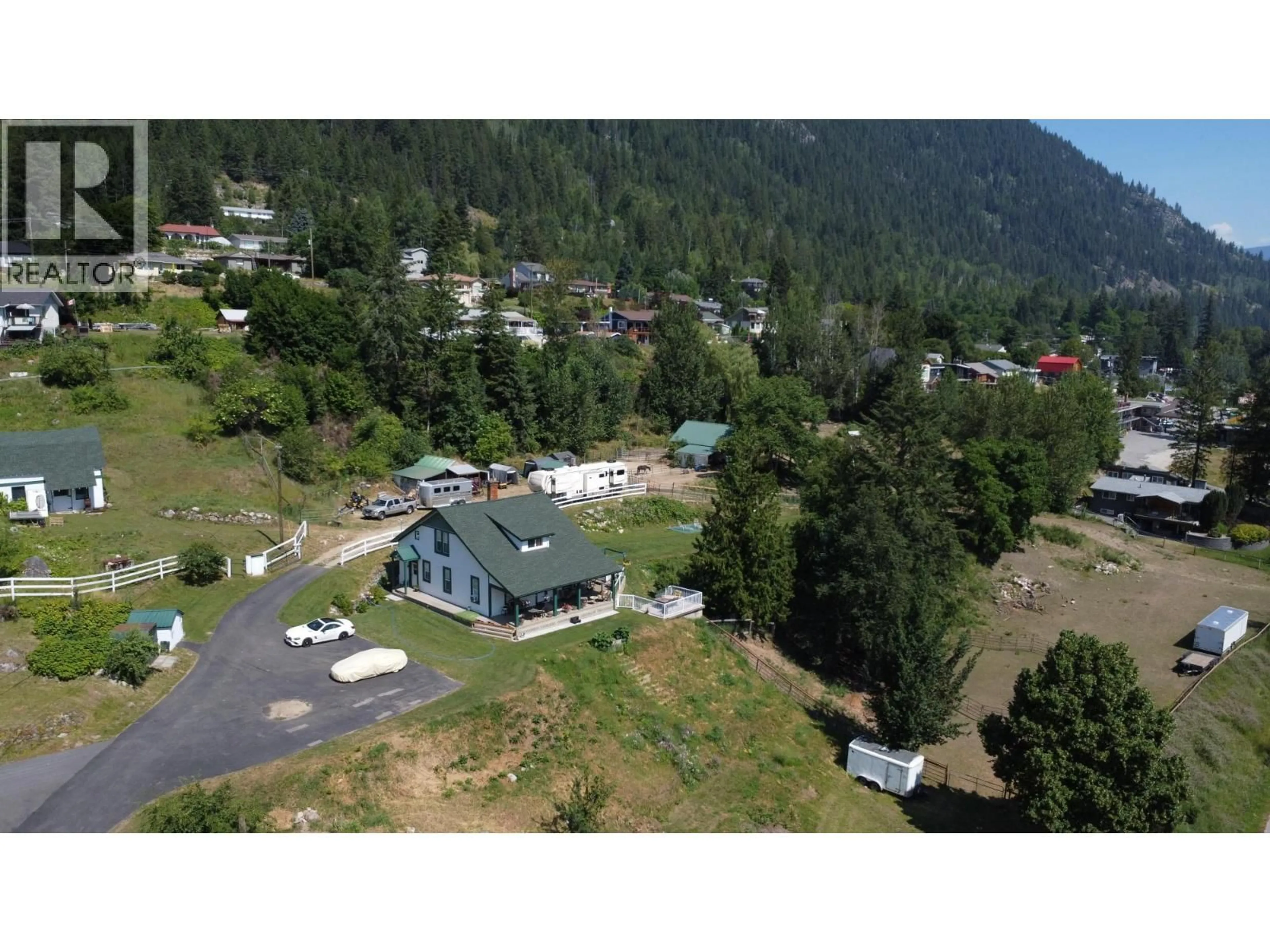 A pic from outside/outdoor area/front of a property/back of a property/a pic from drone, mountain view for 601 VALHALLA ROAD, Nelson British Columbia v1l6m6