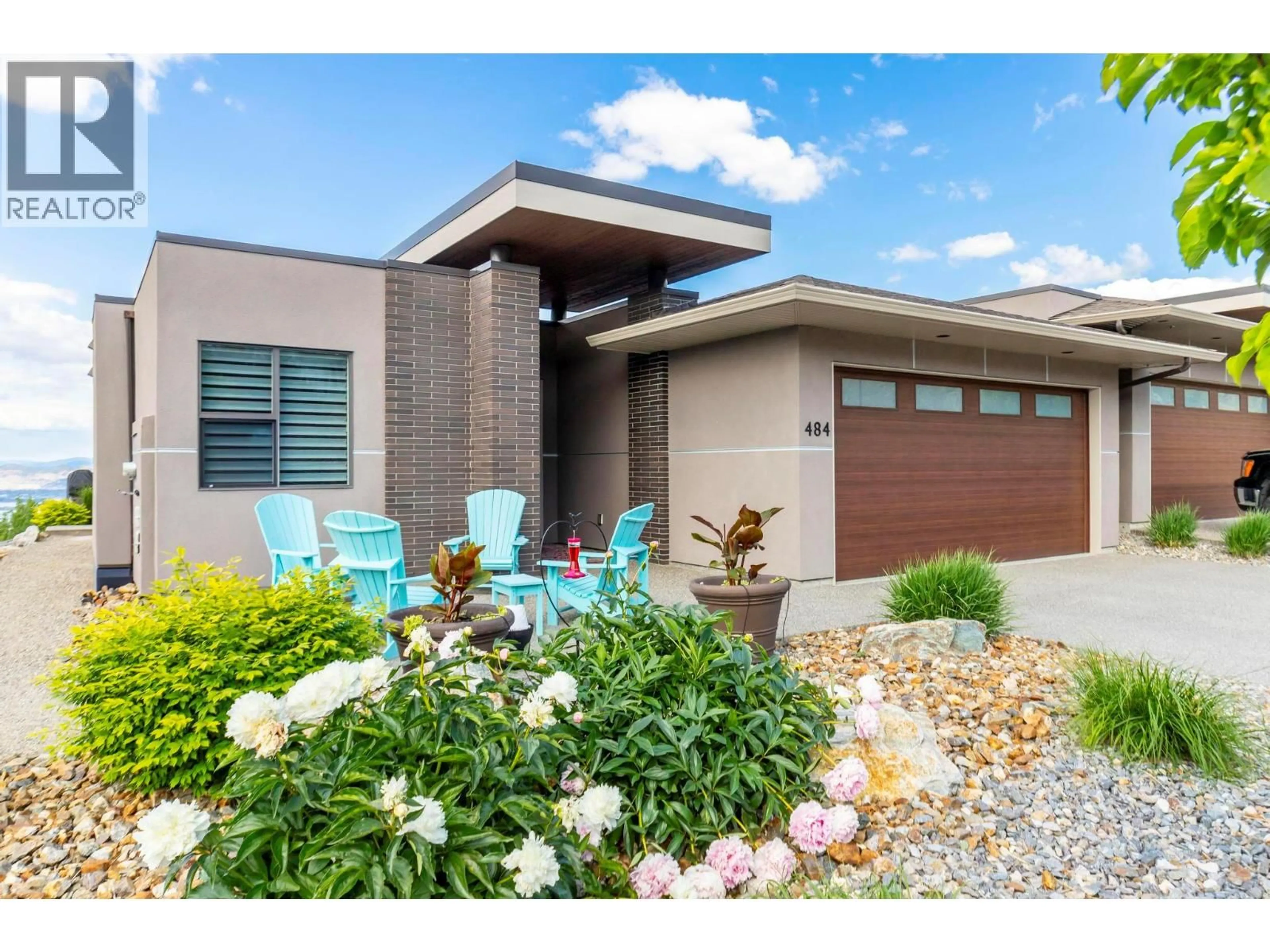 Home with brick exterior material, street for 484 SPARROW HAWK COURT, Kelowna British Columbia V1W0A6