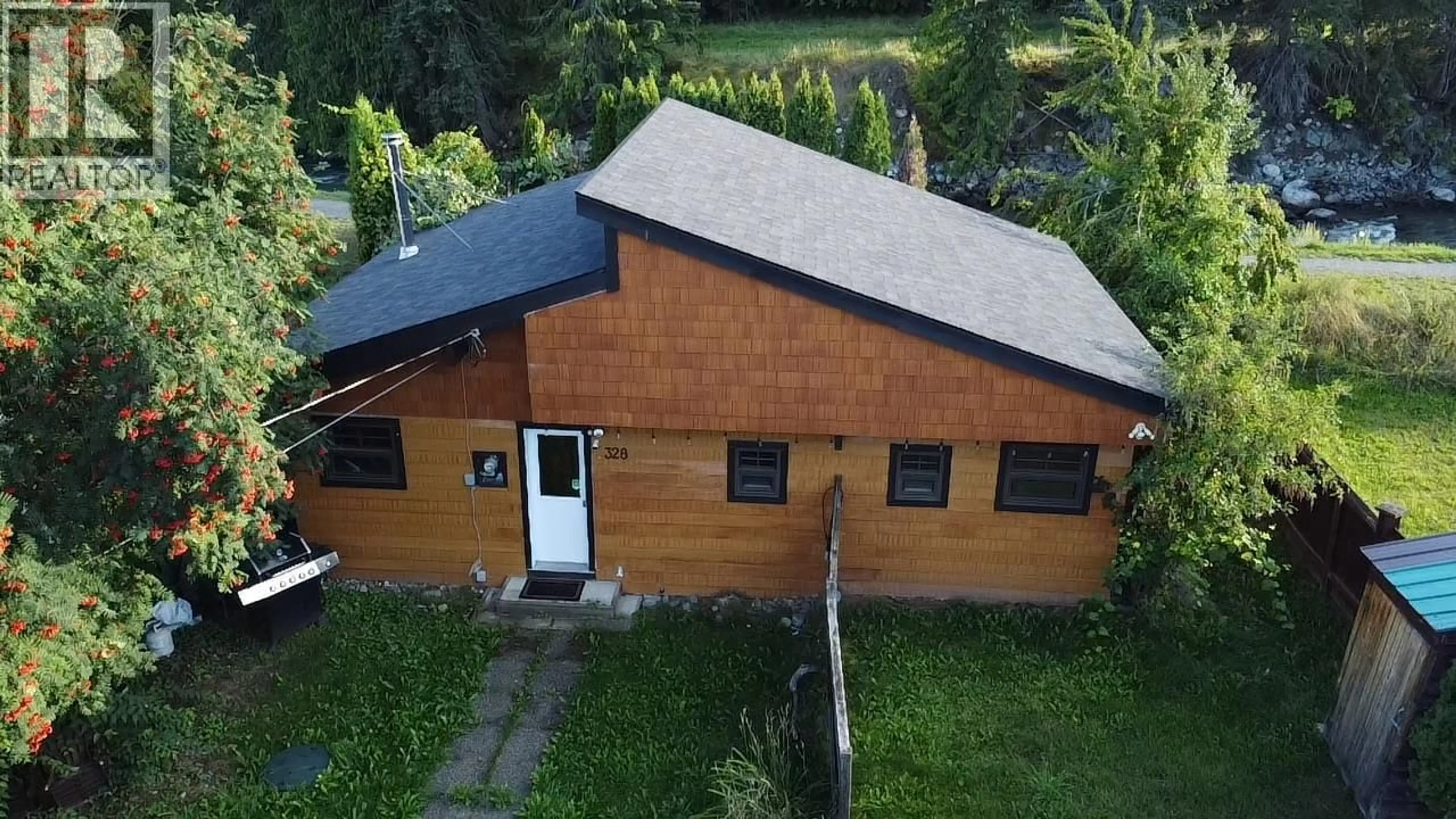 A pic from outside/outdoor area/front of a property/back of a property/a pic from drone, building for 328 RIVER LANE, Kaslo British Columbia V0G1M0