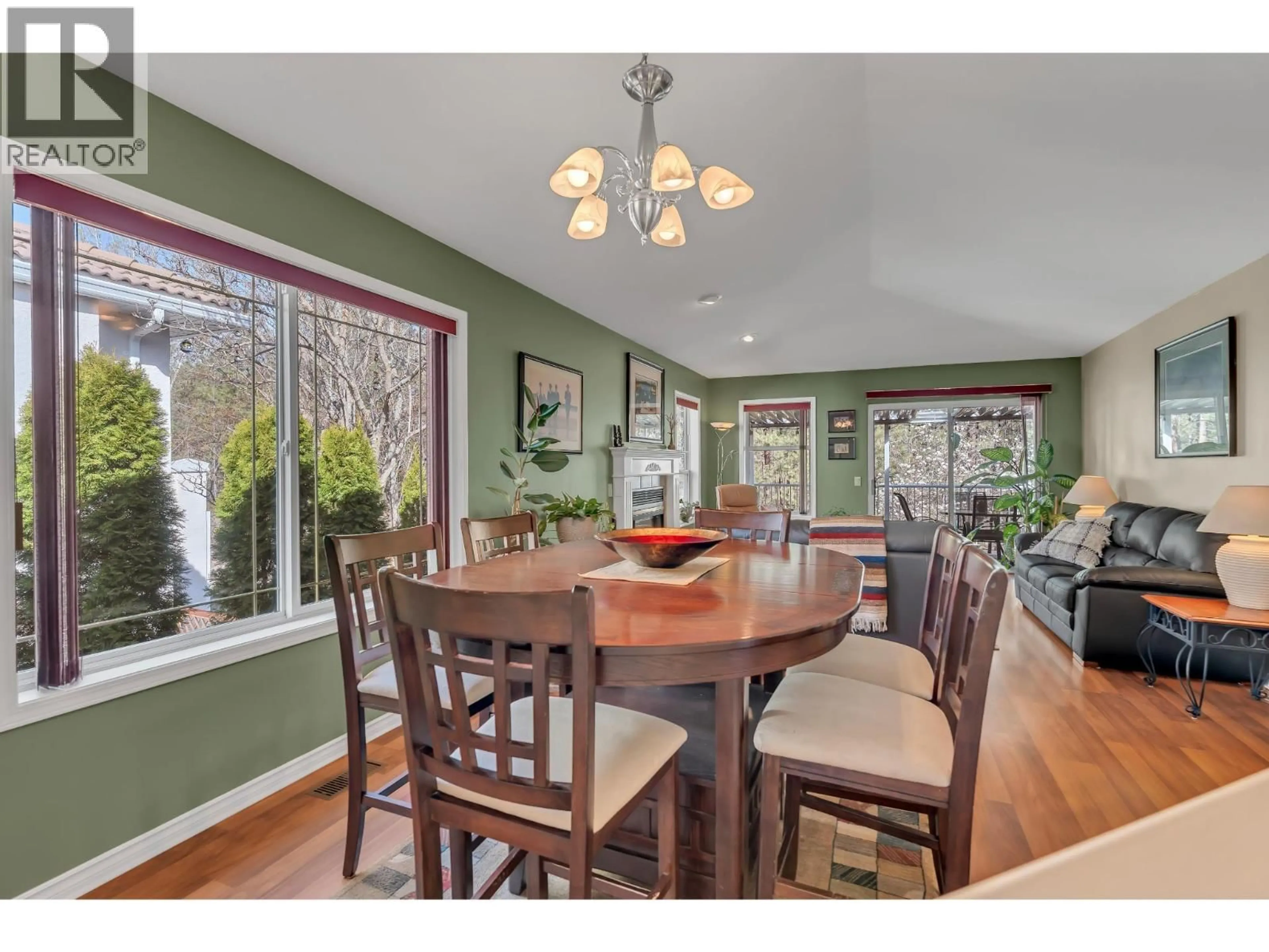 Dining room, wood/laminate floor for 3008 QUAIL CRESCENT, Kelowna British Columbia V1V1Z8