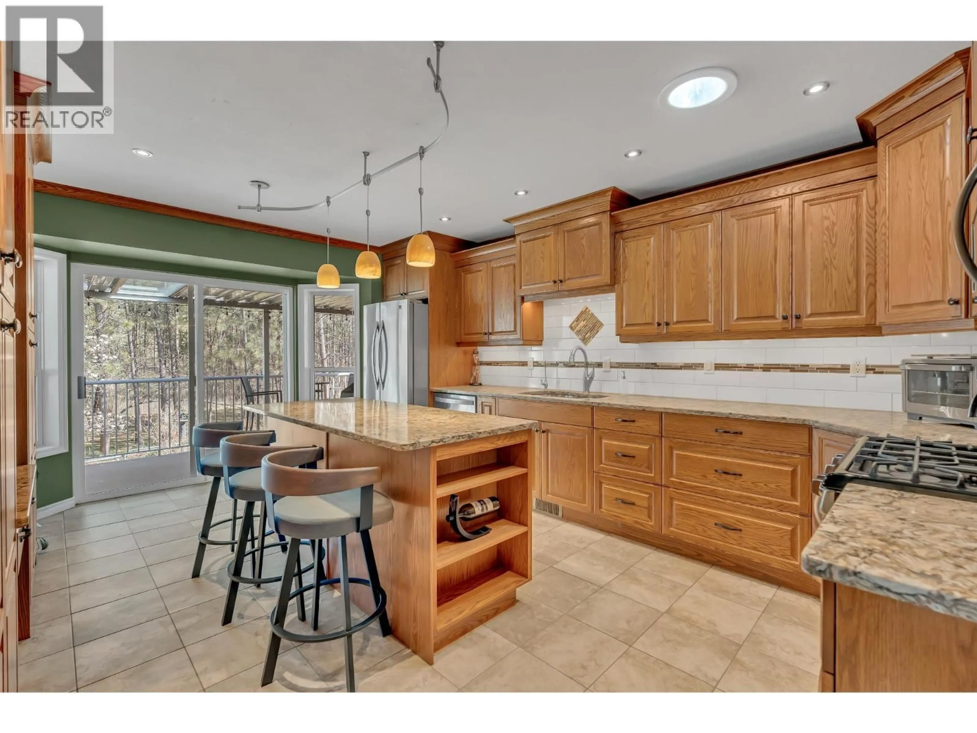 Open concept kitchen, ceramic/tile floor for 3008 QUAIL CRESCENT, Kelowna British Columbia V1V1Z8