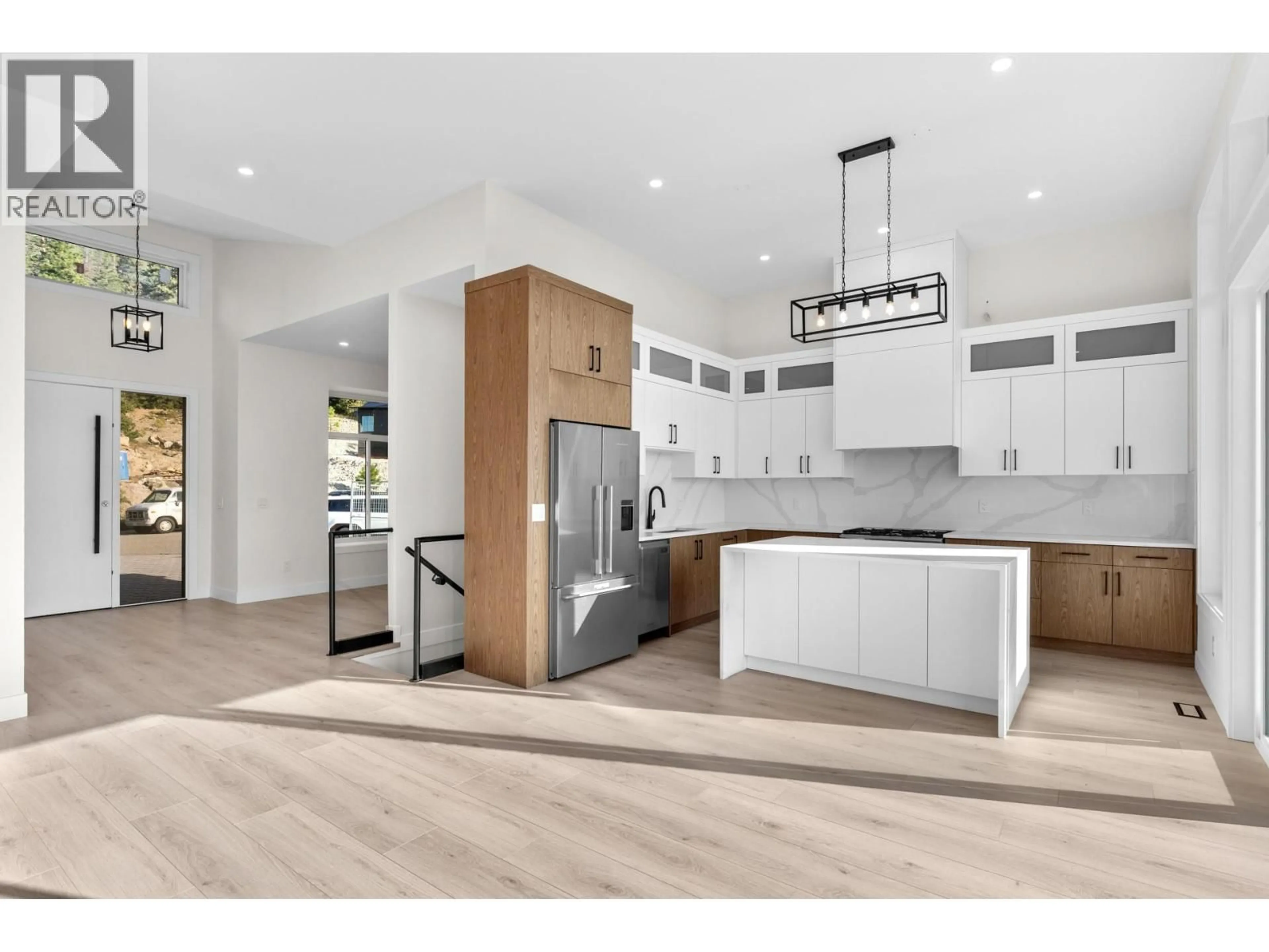 Open concept kitchen, wood/laminate floor for 6048 GERRIE ROAD, Peachland British Columbia V0H1X4