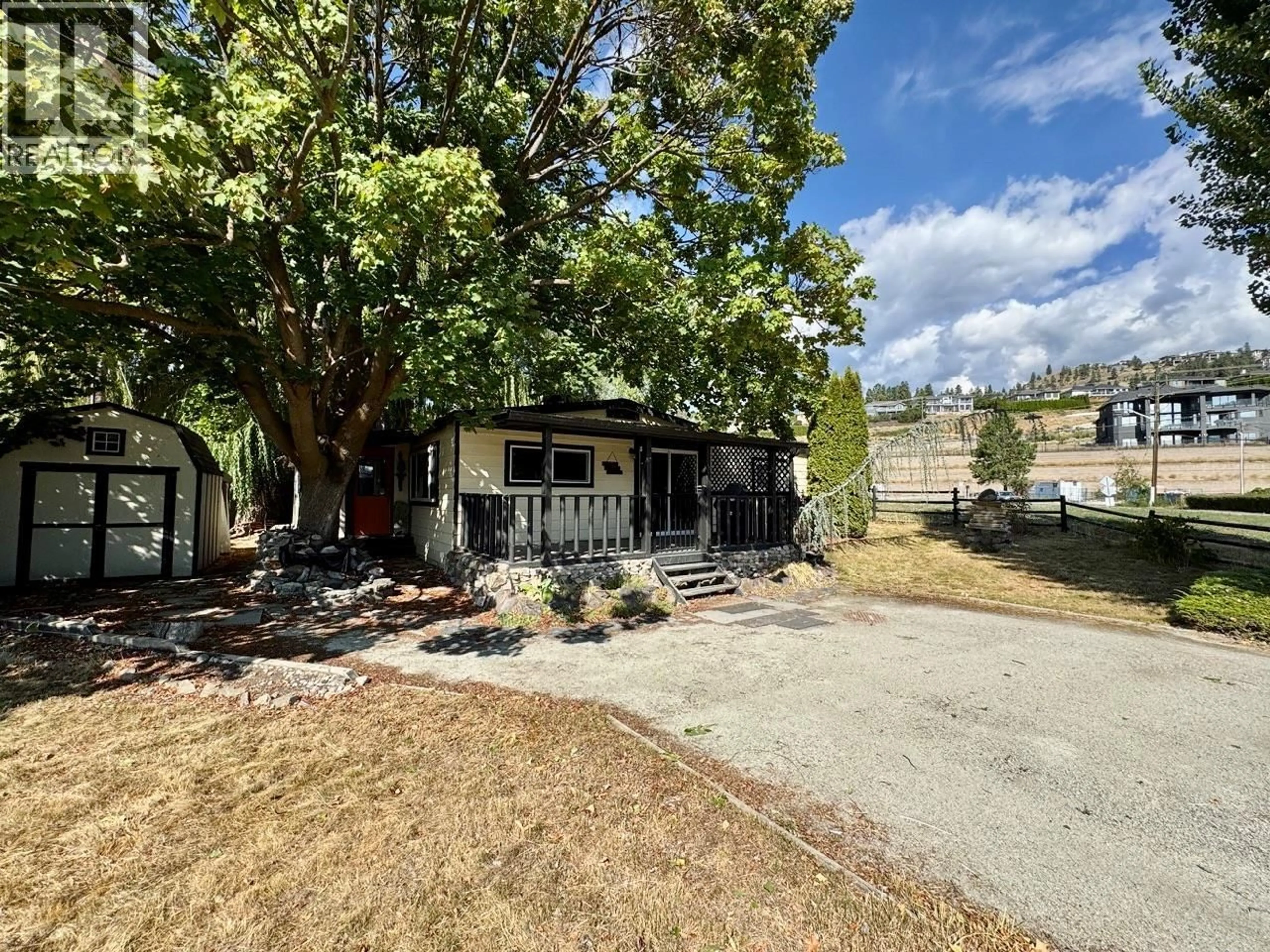 A pic from outside/outdoor area/front of a property/back of a property/a pic from drone, unknown for 20A - 1375 GREEN BAY ROAD, West Kelowna British Columbia V4T2B8