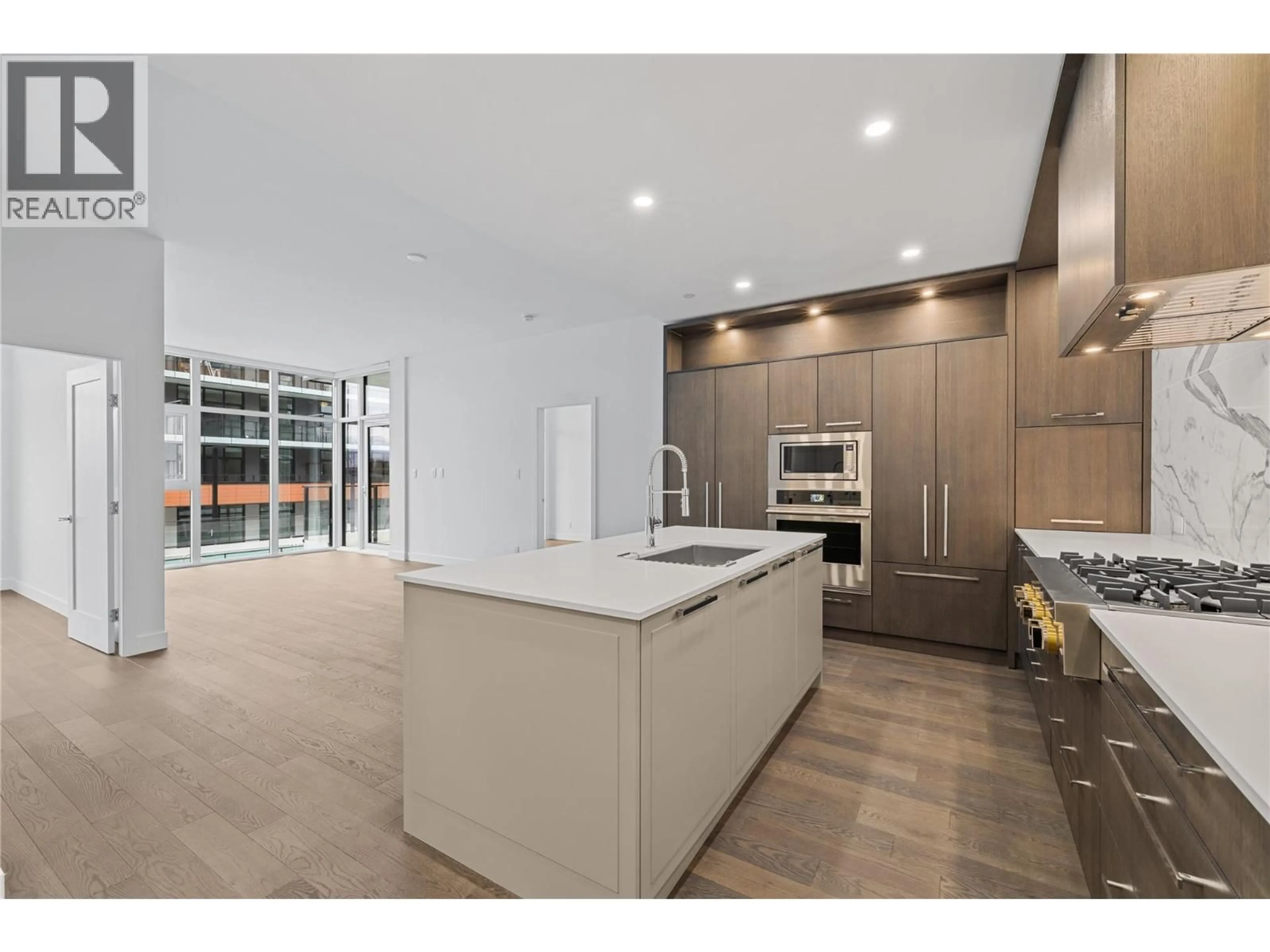 Open concept kitchen, unknown for N313 - 3389 LAKESHORE ROAD, Kelowna British Columbia V1W3S9