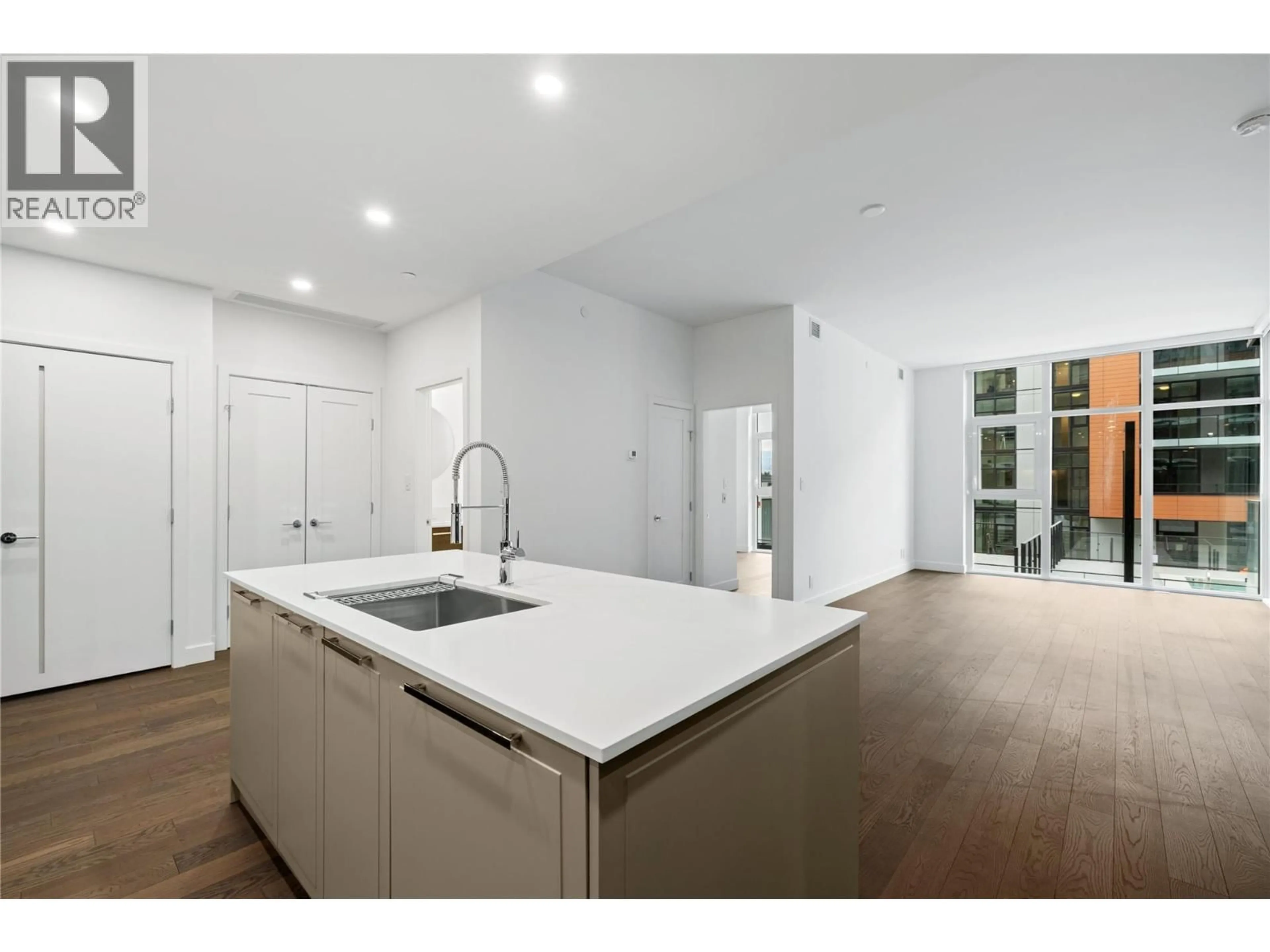 Open concept kitchen, unknown for N313 - 3389 LAKESHORE ROAD, Kelowna British Columbia V1W3S9