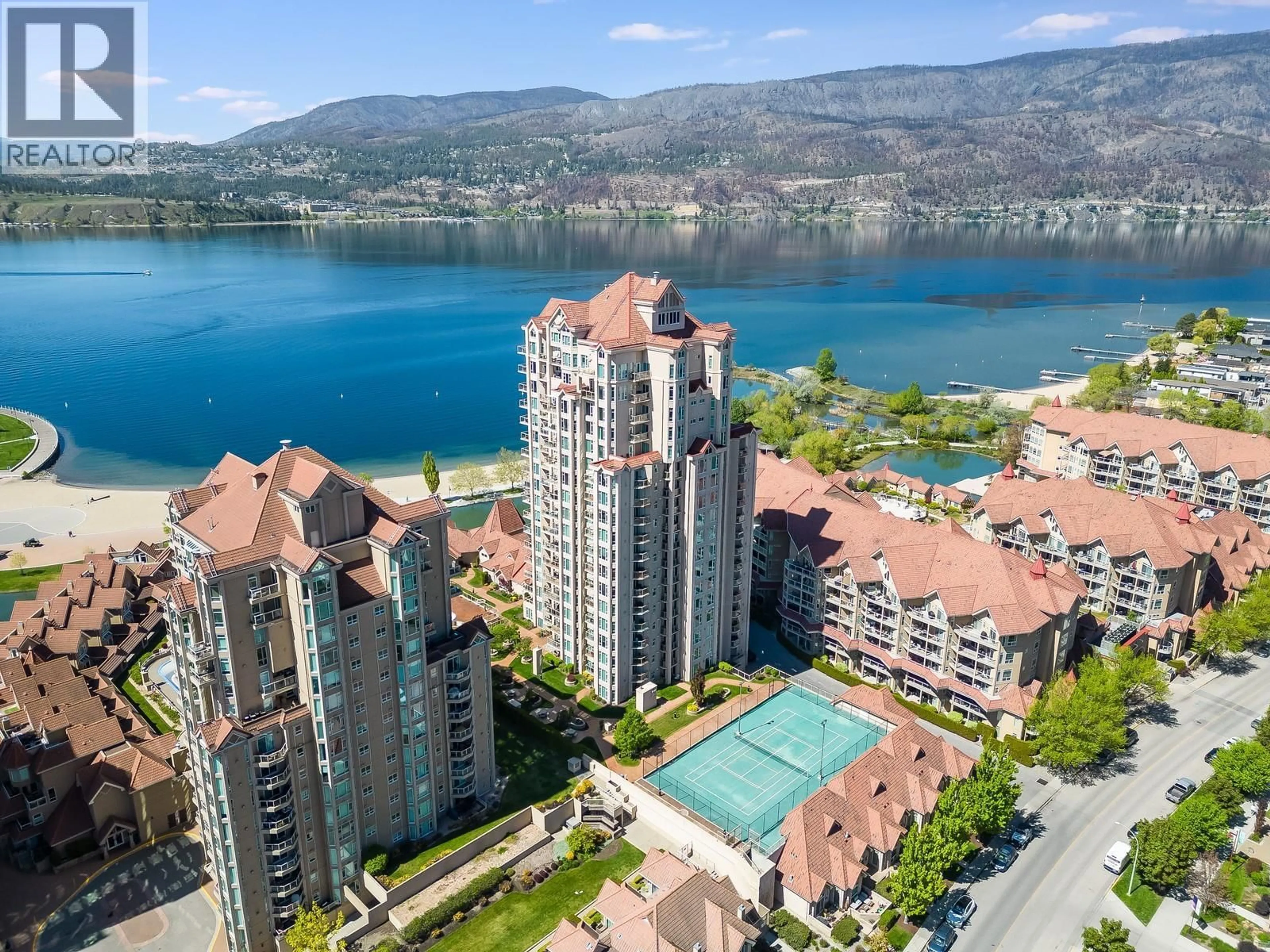 A pic from outside/outdoor area/front of a property/back of a property/a pic from drone, water/lake/river/ocean view for 1703 - 1128 SUNSET DRIVE, Kelowna British Columbia V1Y9W7
