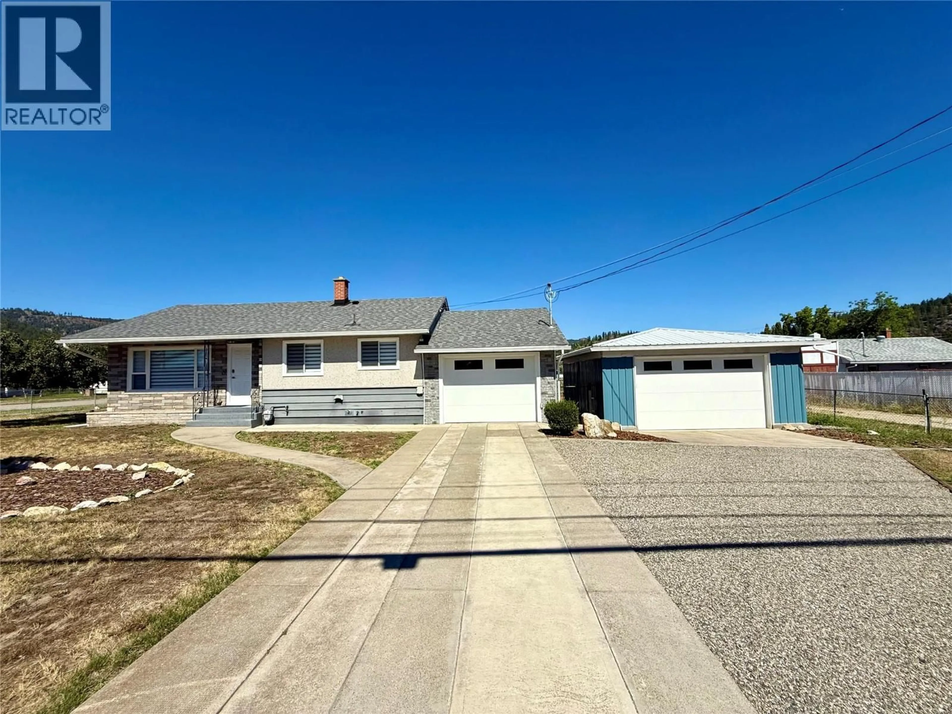 A pic from outside/outdoor area/front of a property/back of a property/a pic from drone, street for 1971 75 AVENUE, Grand Forks British Columbia V0H1H2