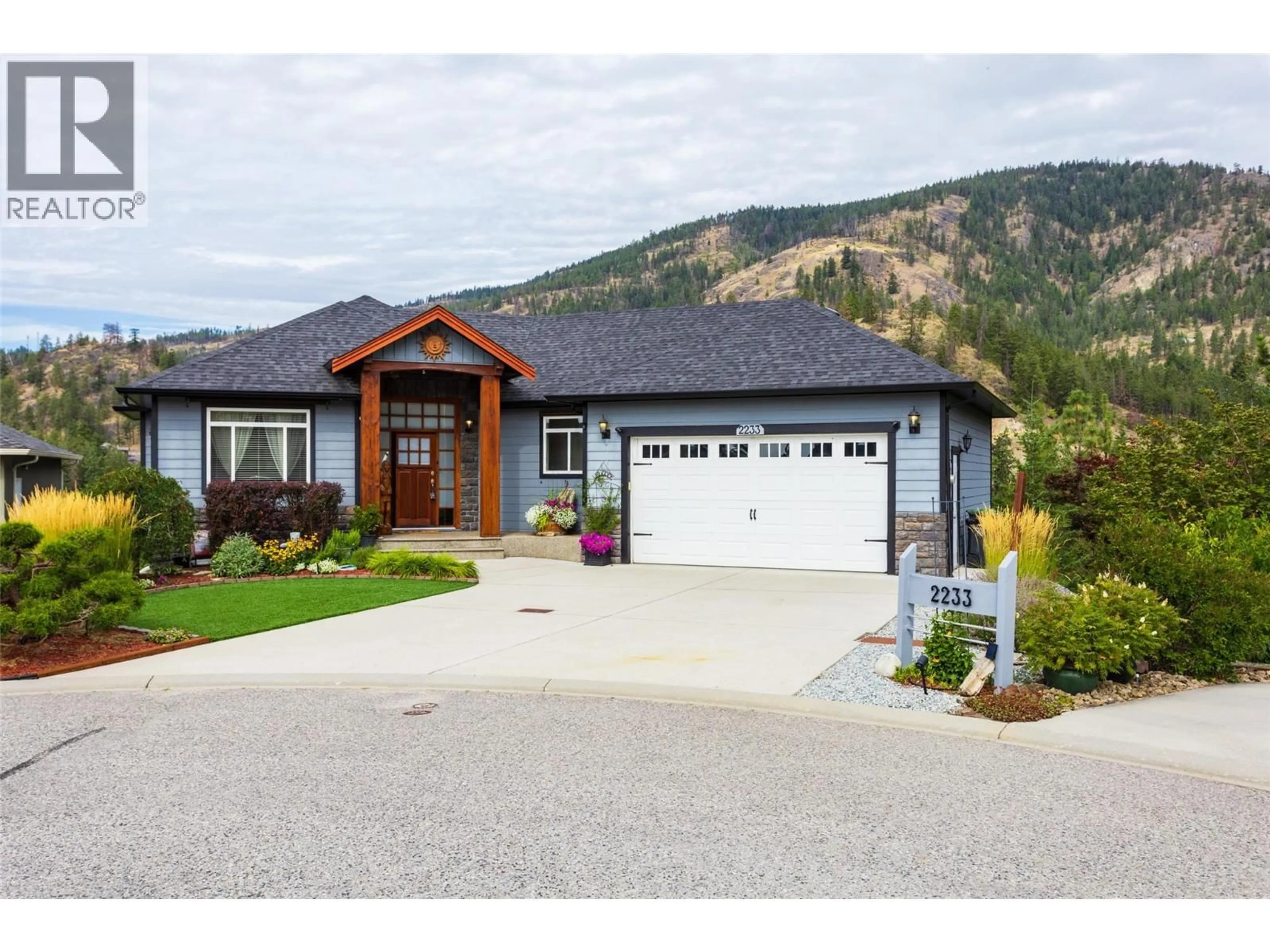 Home with vinyl exterior material, mountain view for 2233 HELGASON DRIVE, West Kelowna British Columbia V4T2W9