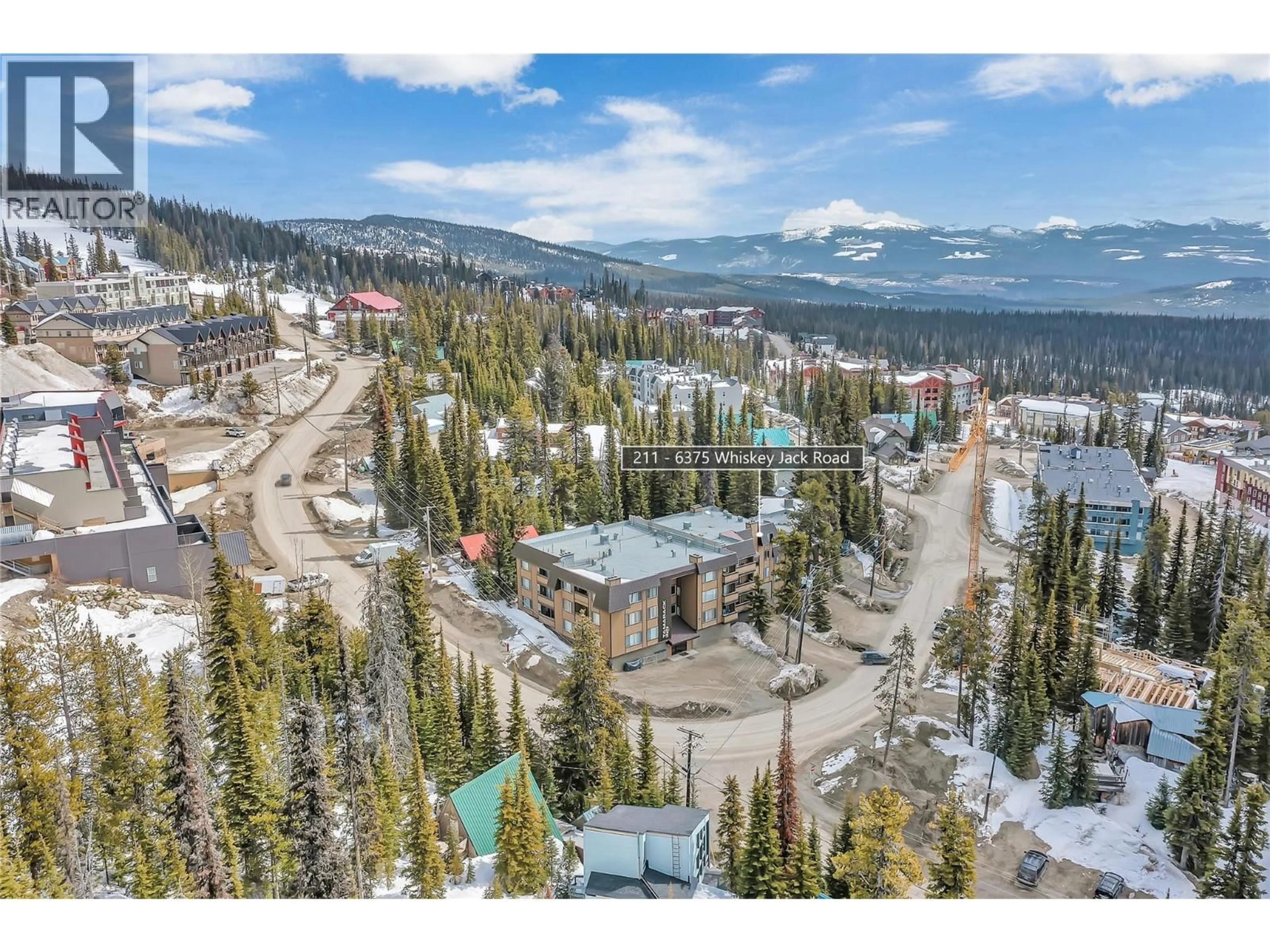 A pic from outside/outdoor area/front of a property/back of a property/a pic from drone, mountain view for 211 - 6375 WHISKEY JACK ROAD, Big White British Columbia V1X4K5