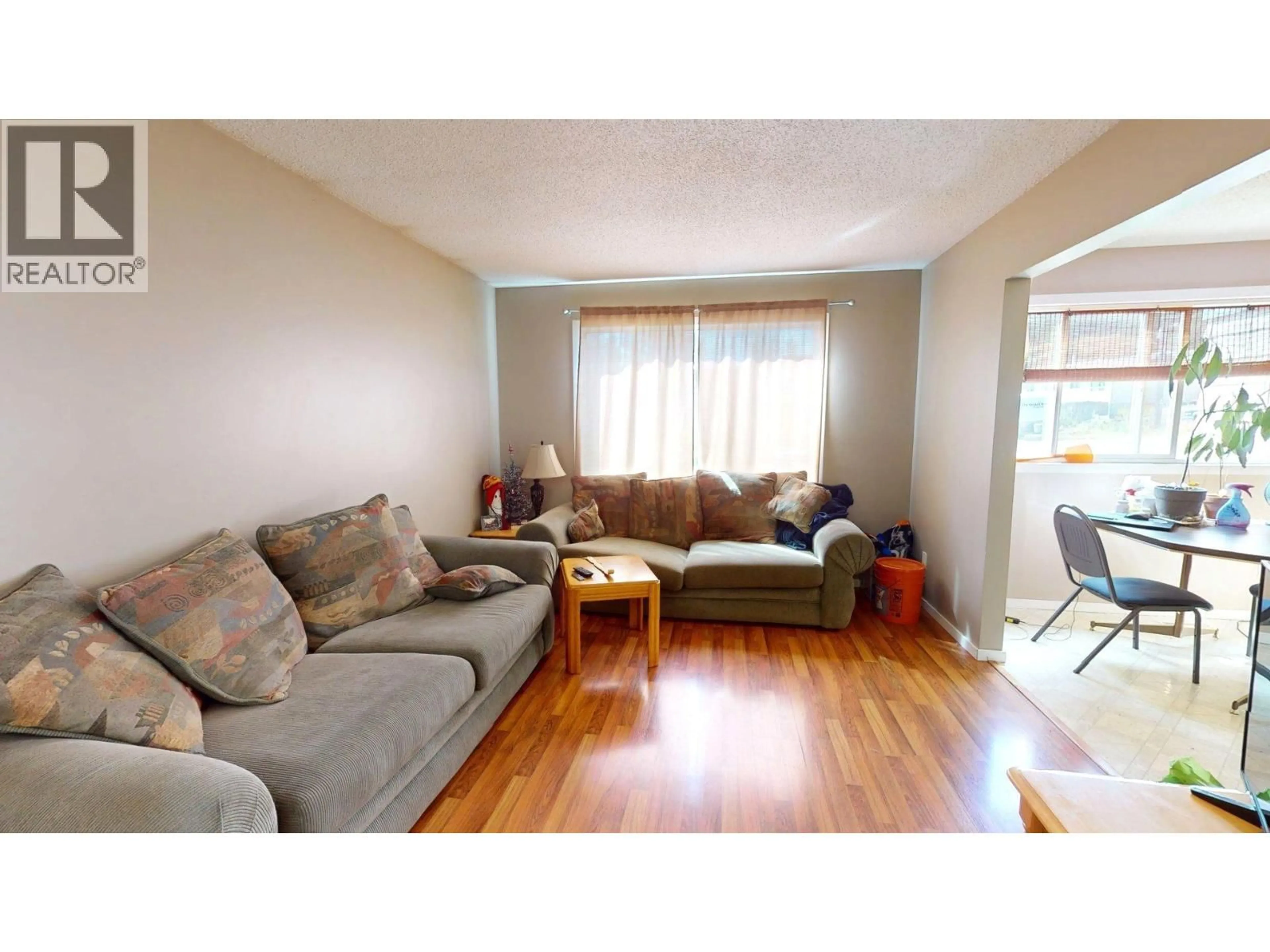 Living room with furniture, wood/laminate floor for 2037 ALDER STREET, Elkford British Columbia V0B1H0