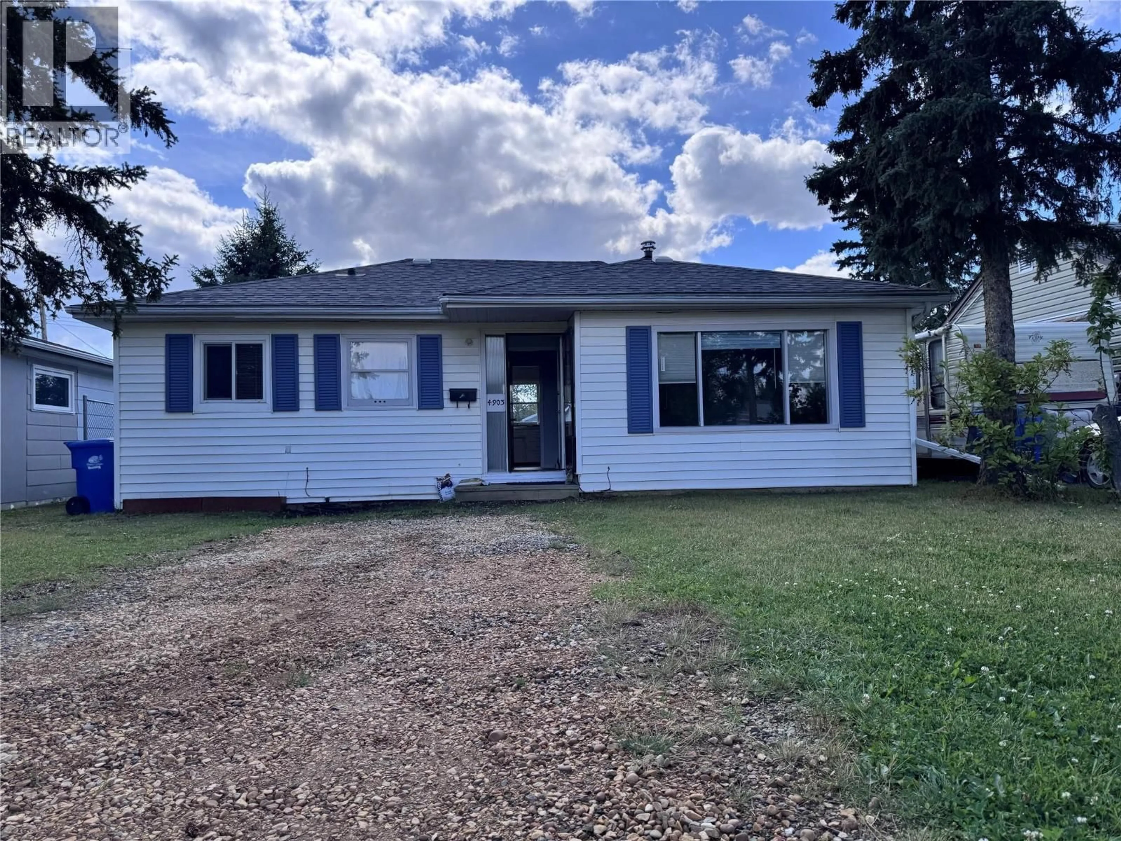 Home with vinyl exterior material, street for 4903 48 AVENUE, Pouce Coupe British Columbia V0C2C0