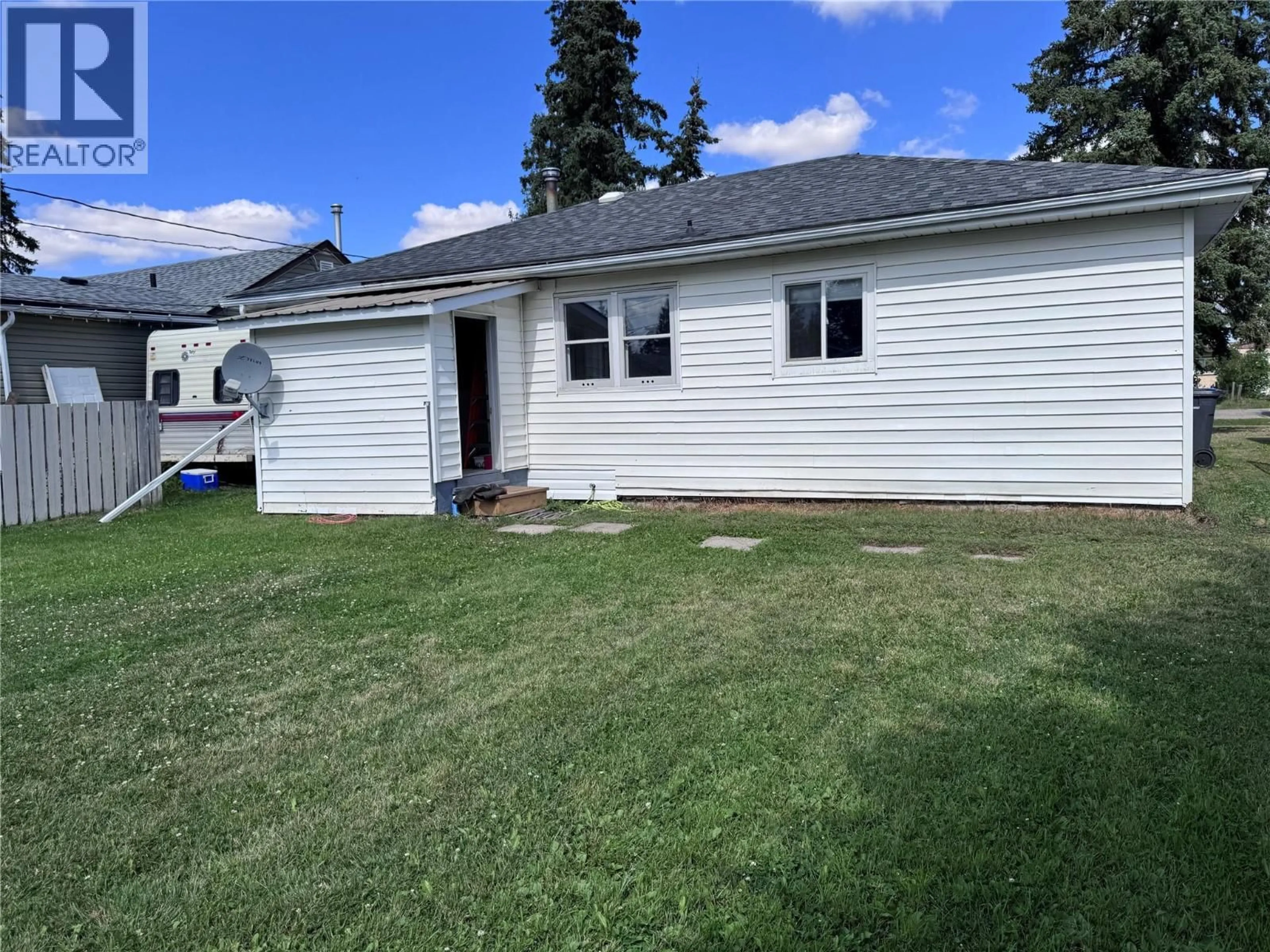 A pic from outside/outdoor area/front of a property/back of a property/a pic from drone, unknown for 4903 48 AVENUE, Pouce Coupe British Columbia V0C2C0