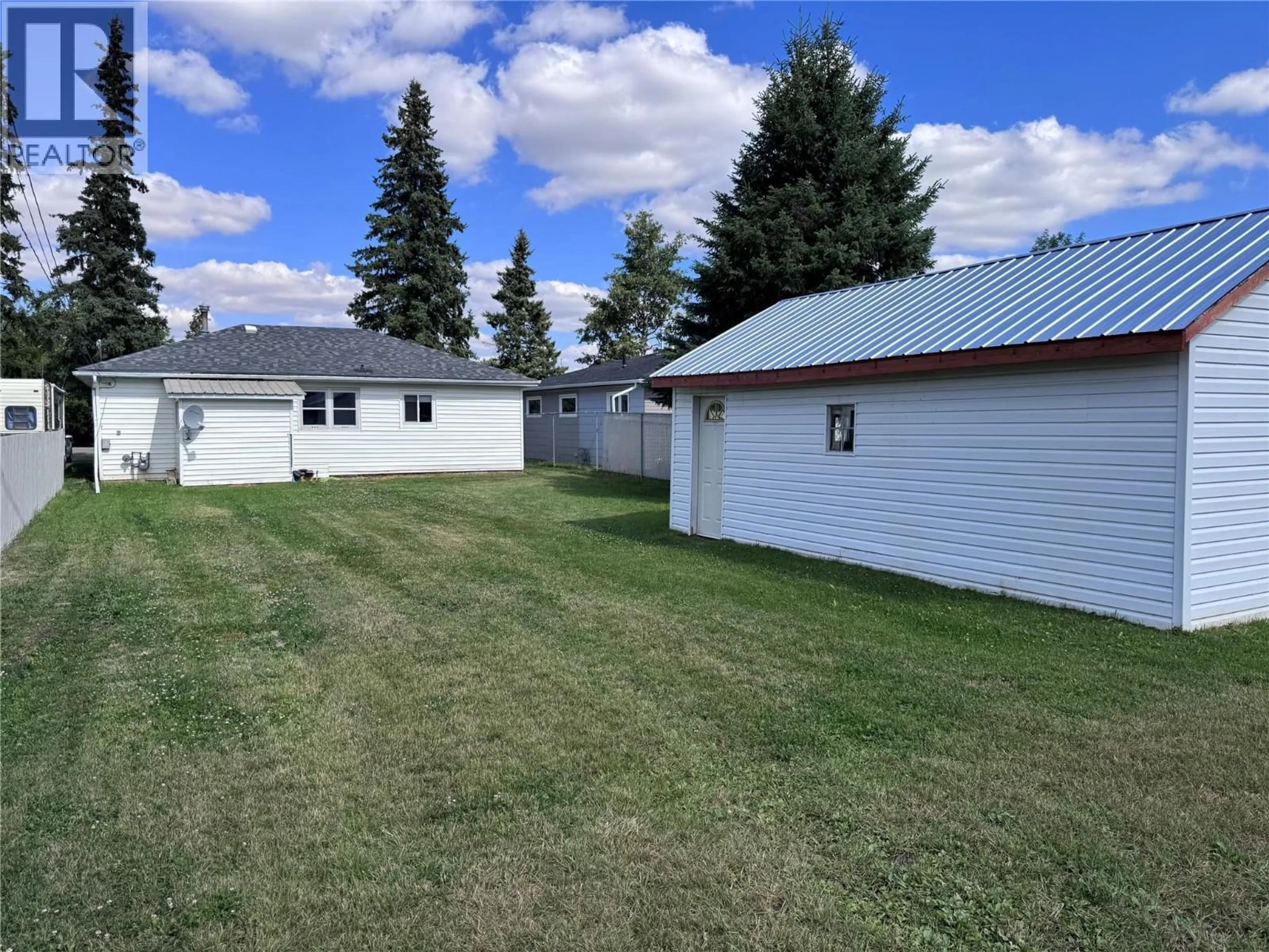 A pic from outside/outdoor area/front of a property/back of a property/a pic from drone, street for 4903 48 AVENUE, Pouce Coupe British Columbia V0C2C0