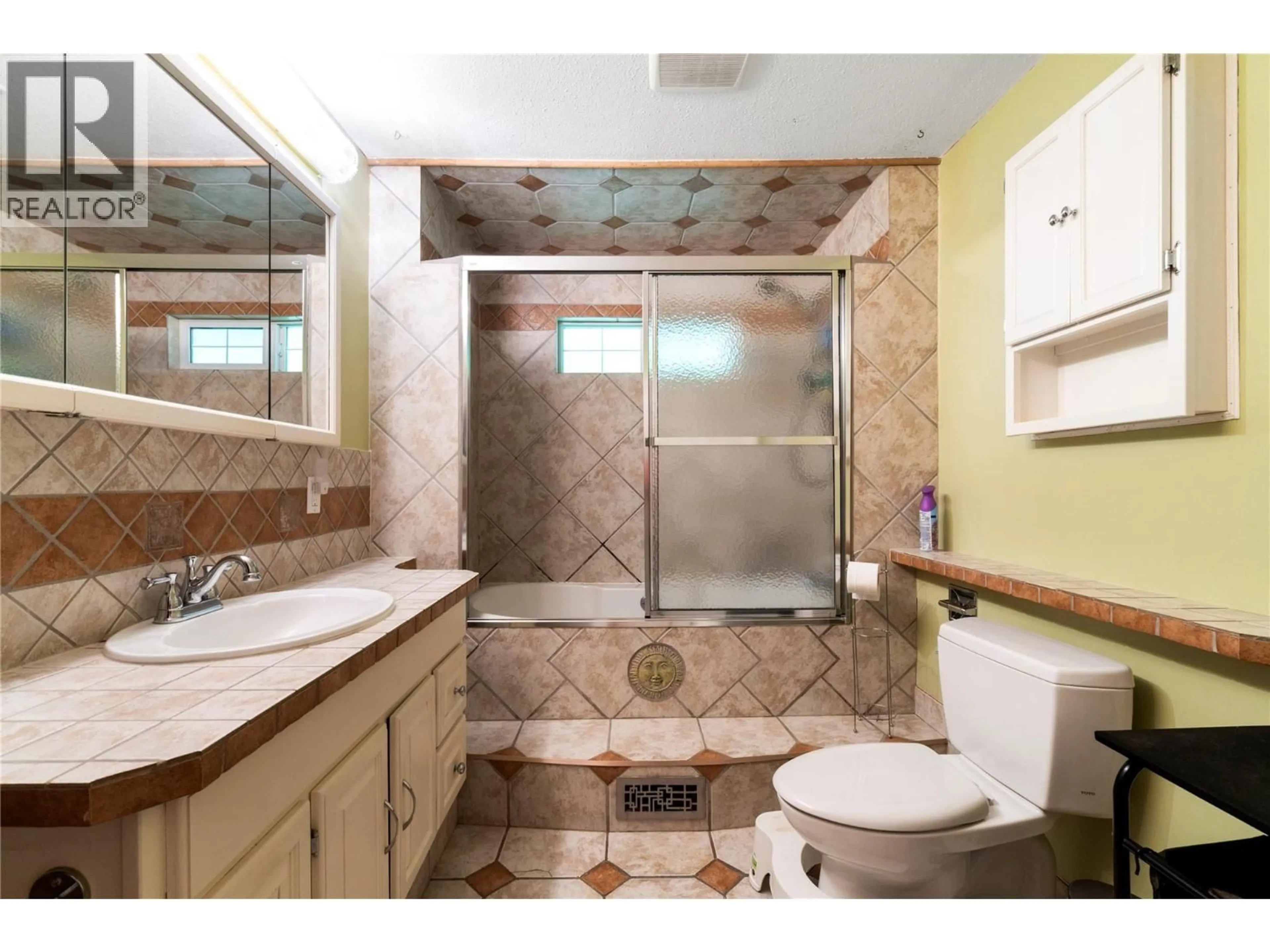 Standard bathroom, ceramic/tile floor for 124 SALMON ARM DRIVE, Enderby British Columbia V0E1V1