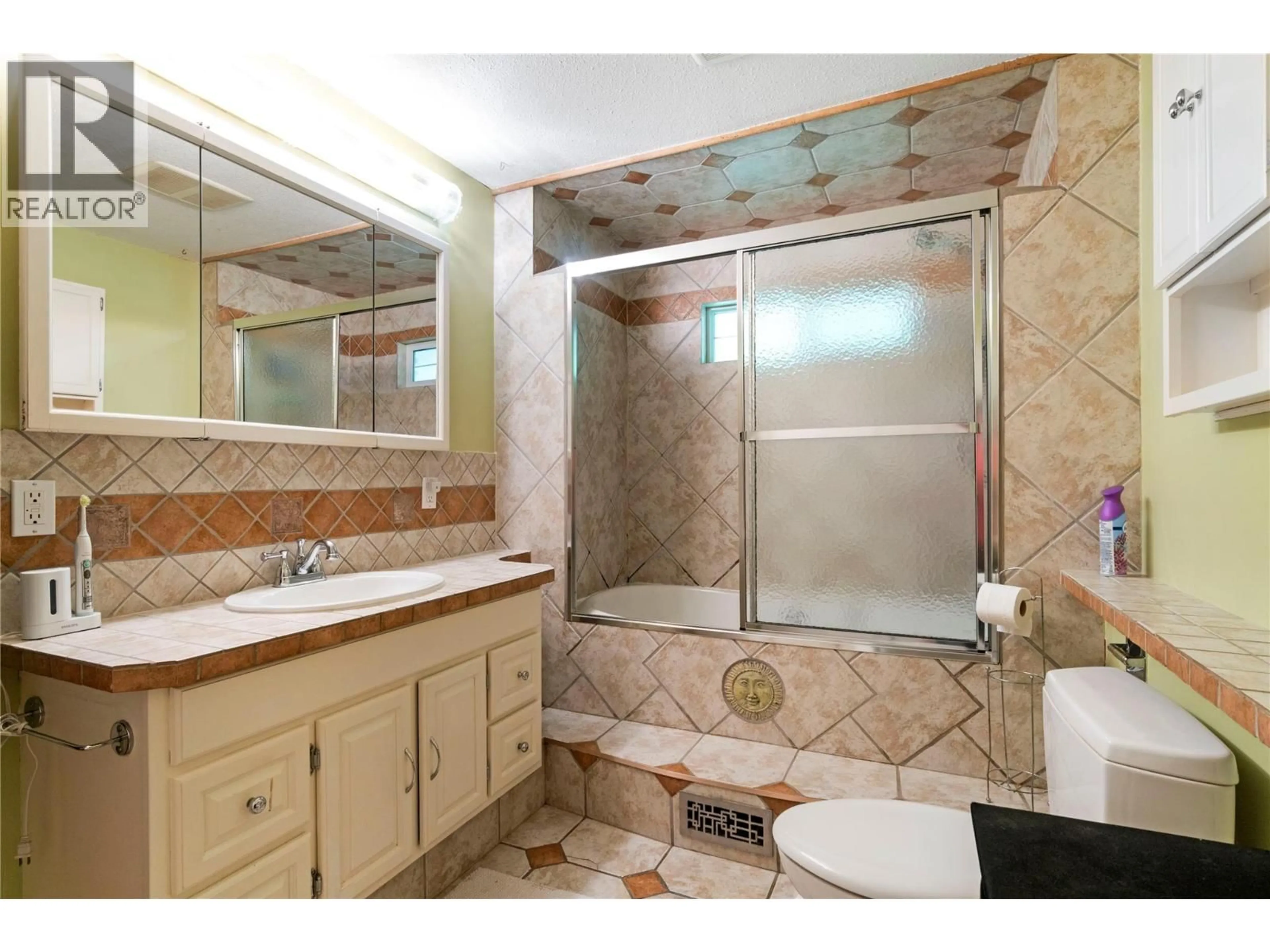 Standard bathroom, ceramic/tile floor for 124 SALMON ARM DRIVE, Enderby British Columbia V0E1V1