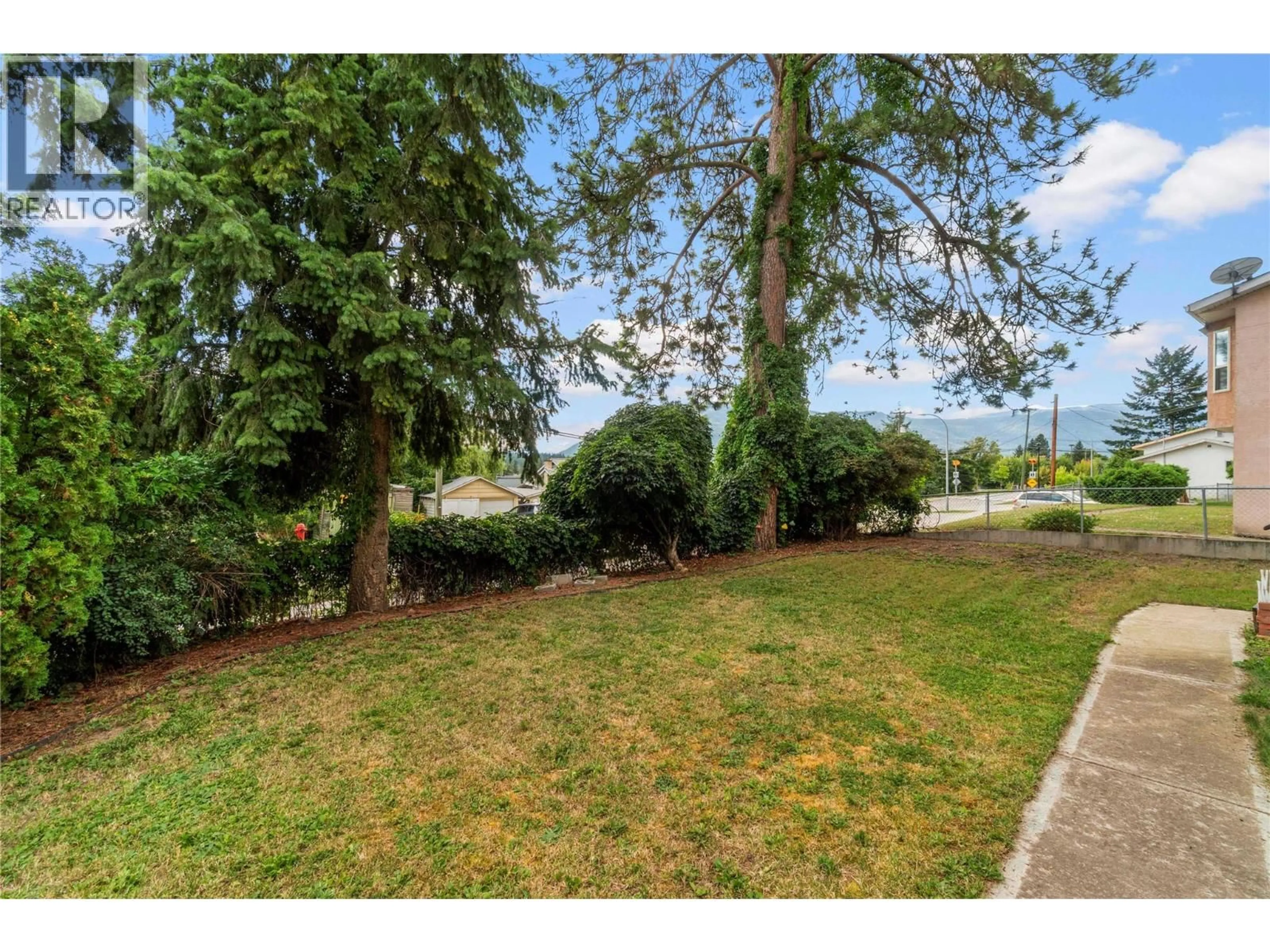 A pic from outside/outdoor area/front of a property/back of a property/a pic from drone, unknown for 124 SALMON ARM DRIVE, Enderby British Columbia V0E1V1
