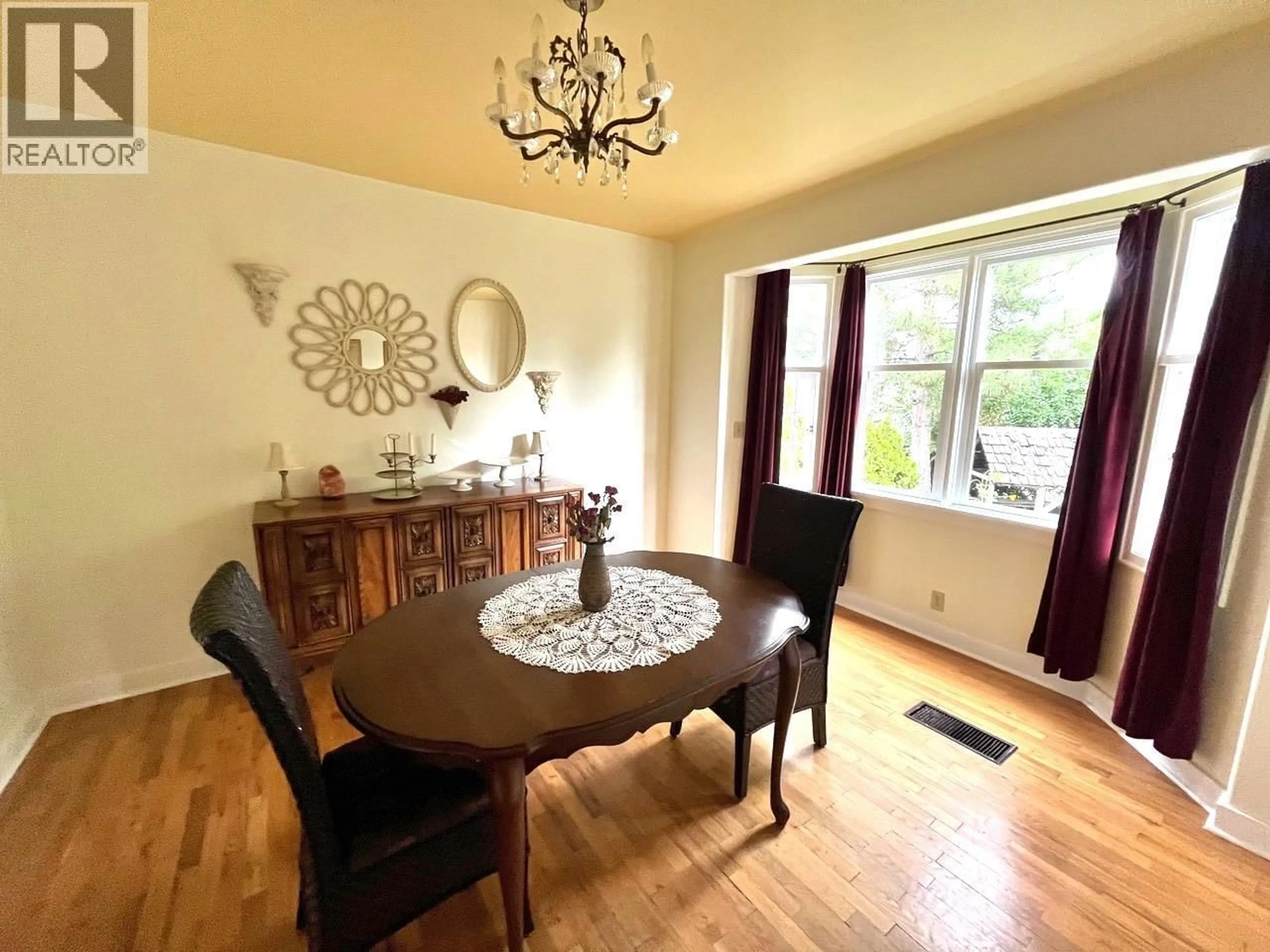 Dining room, wood/laminate floor for 1419 CHERRY CRESCENT WEST, Kelowna British Columbia V1Y3X9