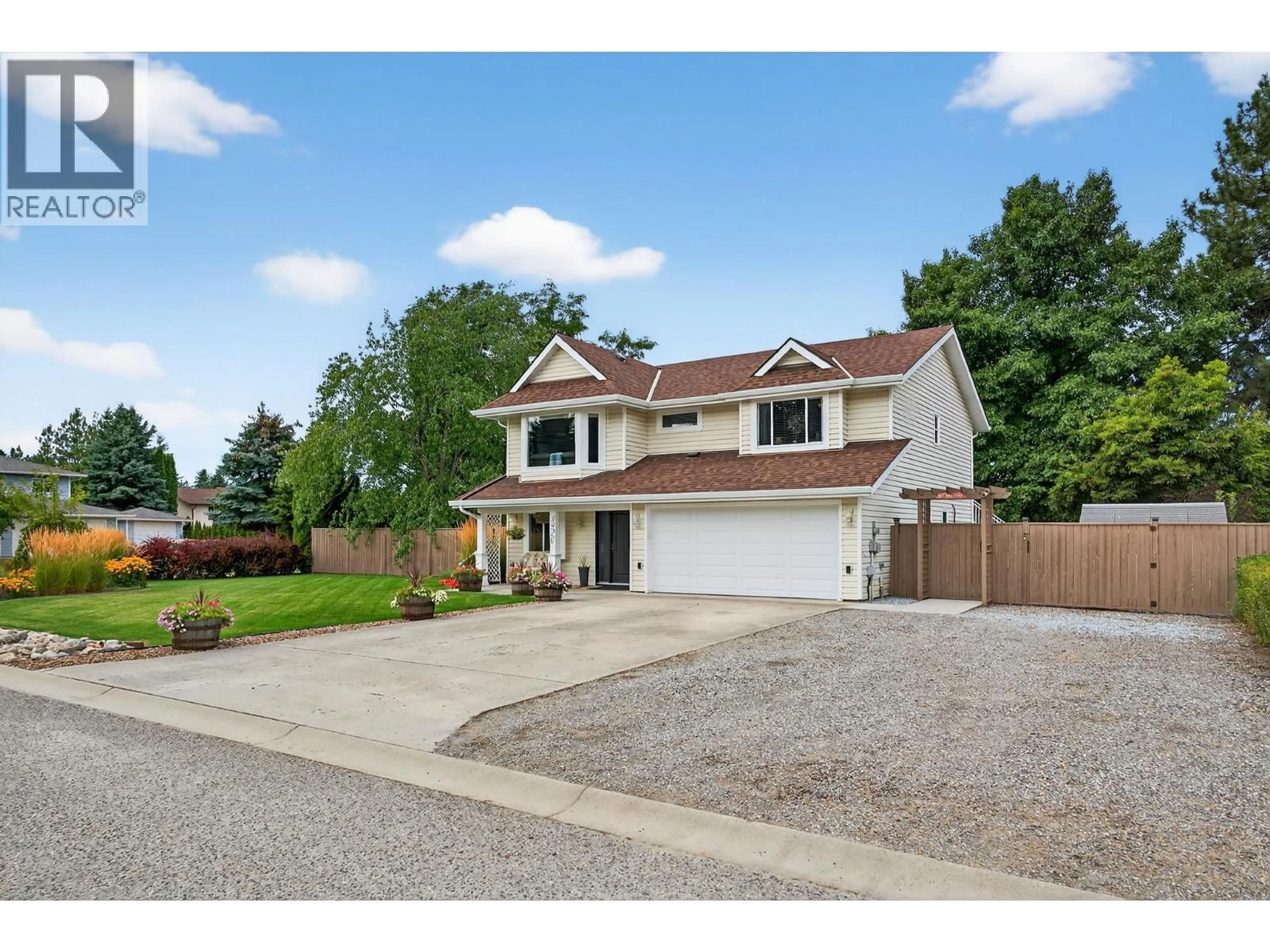 Home with vinyl exterior material, street for 3920 MOWITCH COURT, Kelowna British Columbia V1W4E6