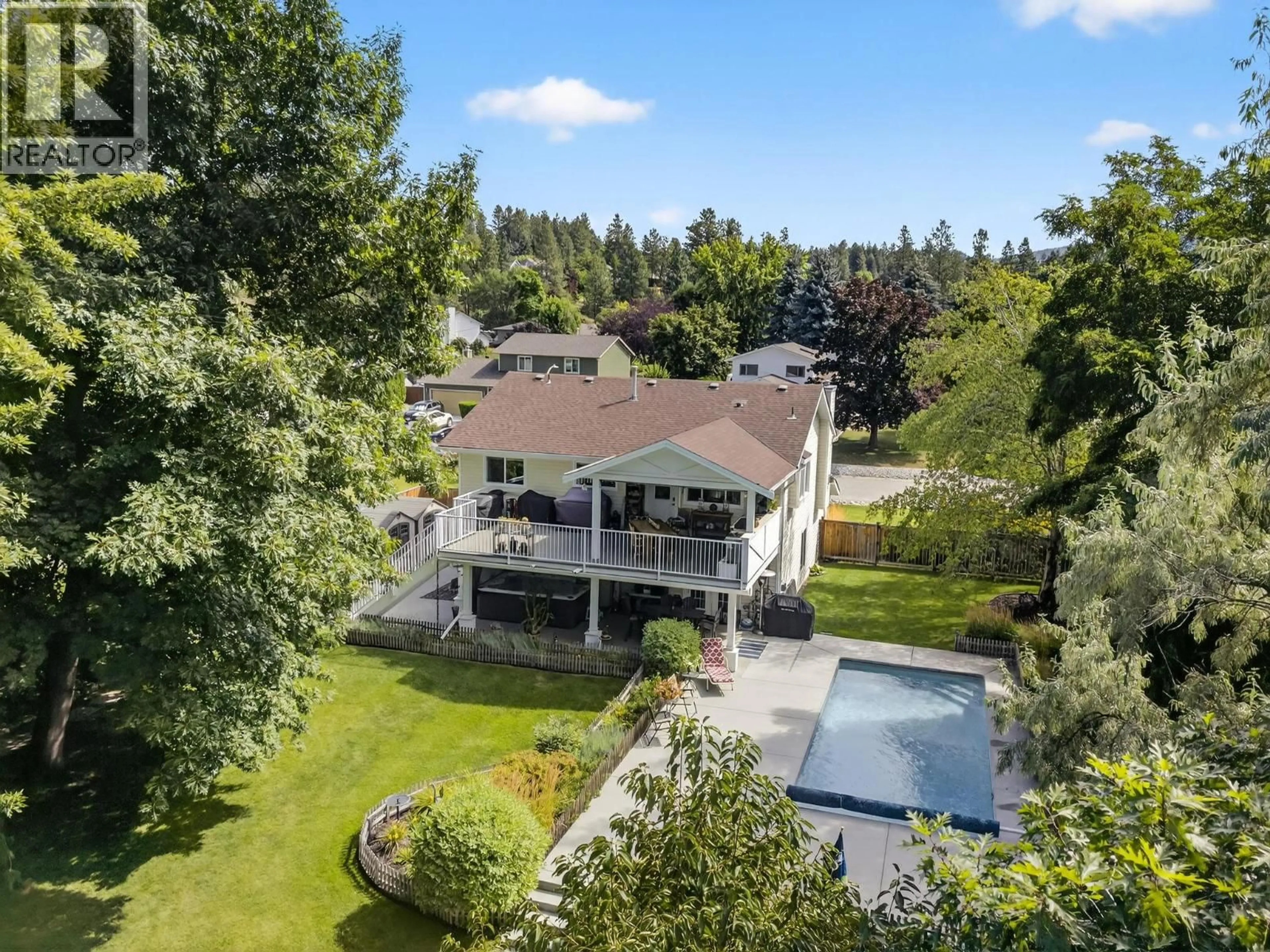 A pic from outside/outdoor area/front of a property/back of a property/a pic from drone, water/lake/river/ocean view for 3920 MOWITCH COURT, Kelowna British Columbia V1W4E6