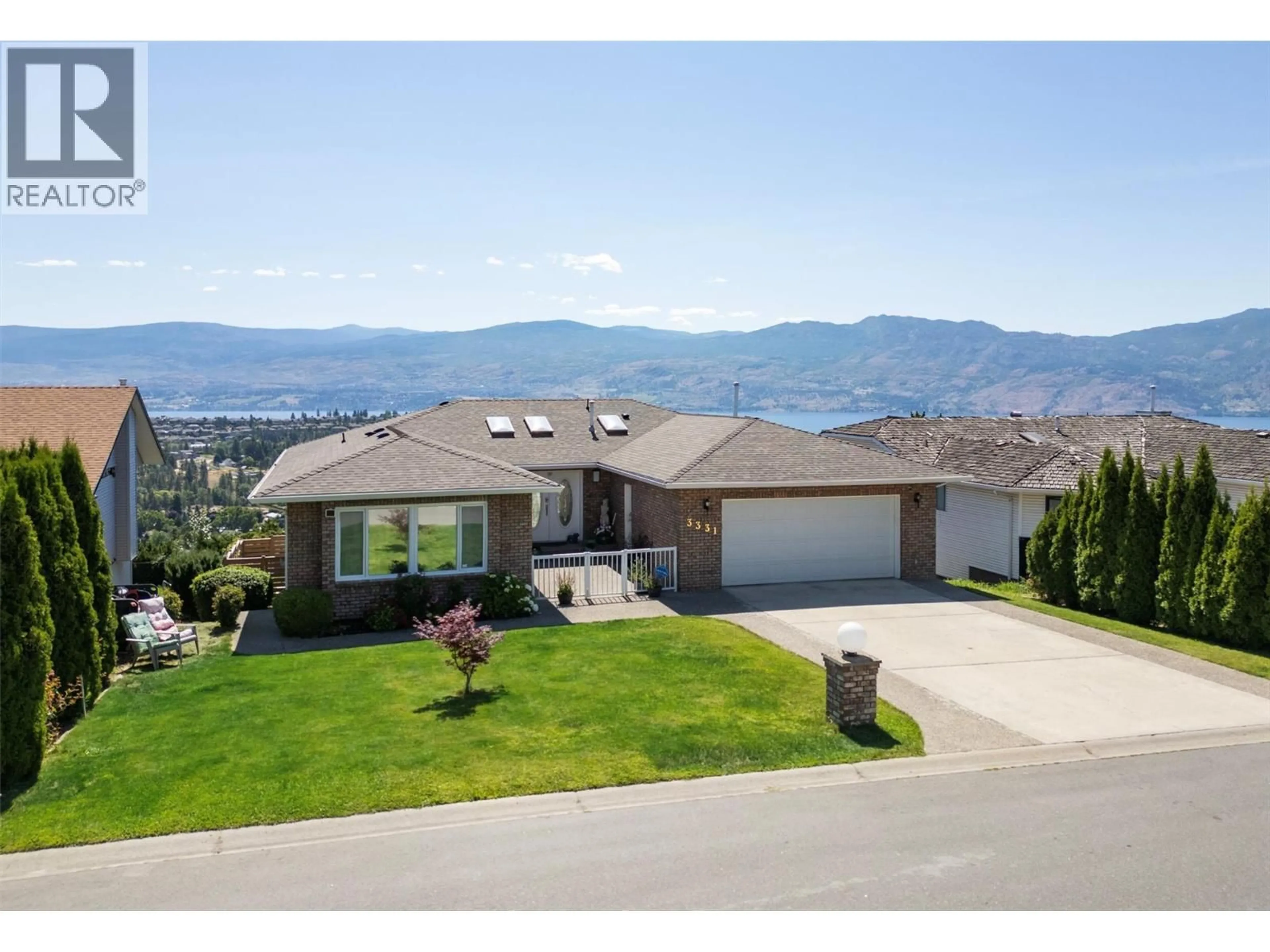 A pic from outside/outdoor area/front of a property/back of a property/a pic from drone, mountain view for 3331 SUNDANCE DRIVE, West Kelowna British Columbia V4T1S5