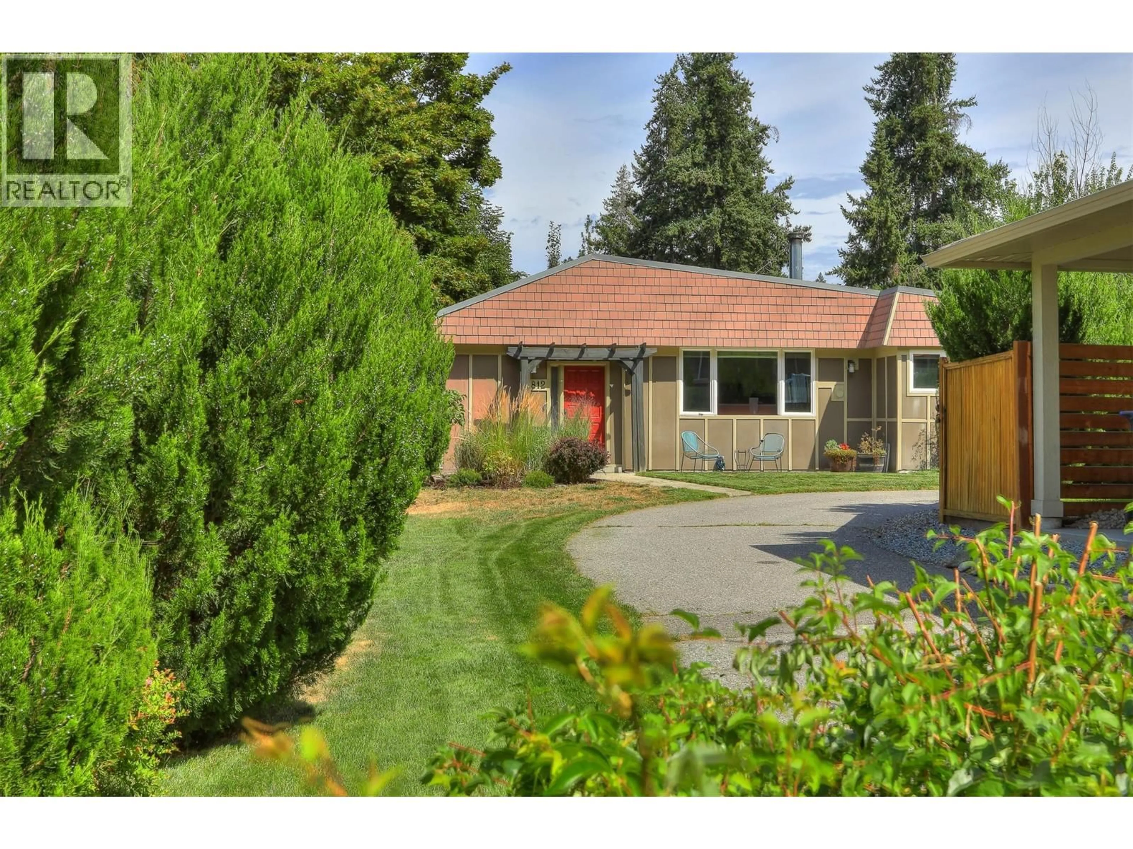 Home with brick exterior material, street for 812 PARET ROAD, Kelowna British Columbia V1W4P2