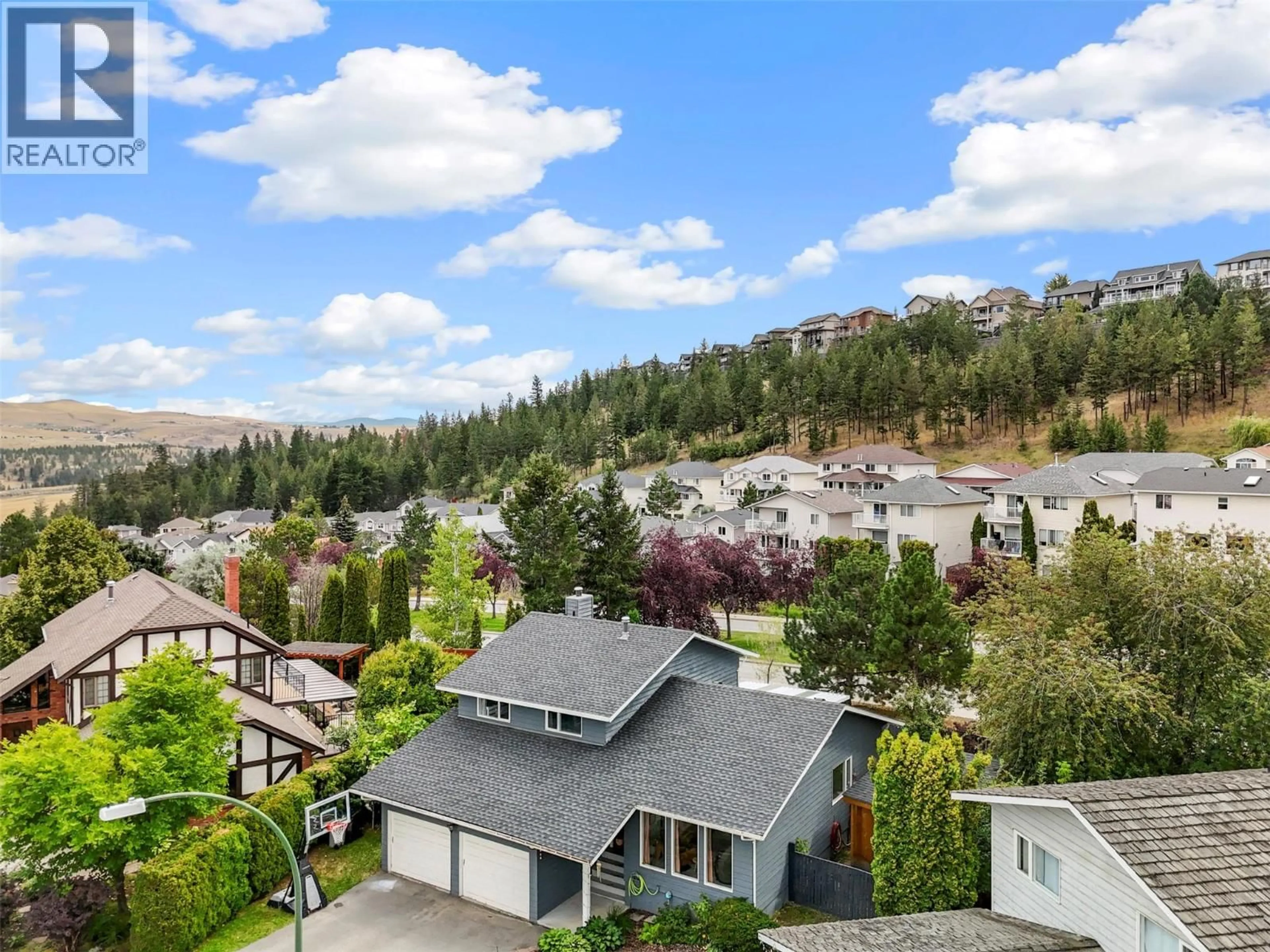 A pic from outside/outdoor area/front of a property/back of a property/a pic from drone, mountain view for 2295 MACINTYRE PLACE, Kamloops British Columbia V1S1H7