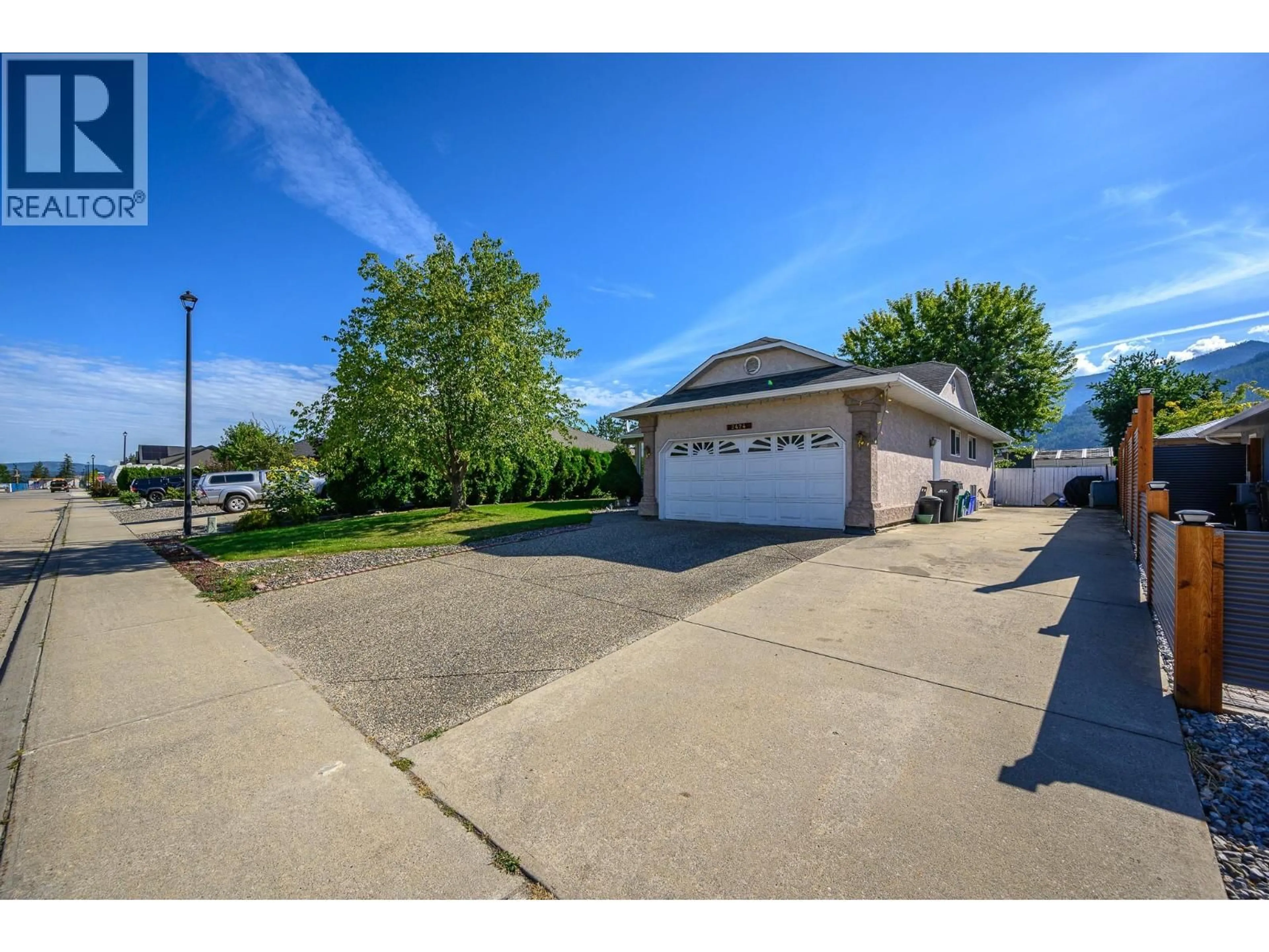 A pic from outside/outdoor area/front of a property/back of a property/a pic from drone, street for 2424 BRADLEY DRIVE, Armstrong British Columbia V4Y0C4