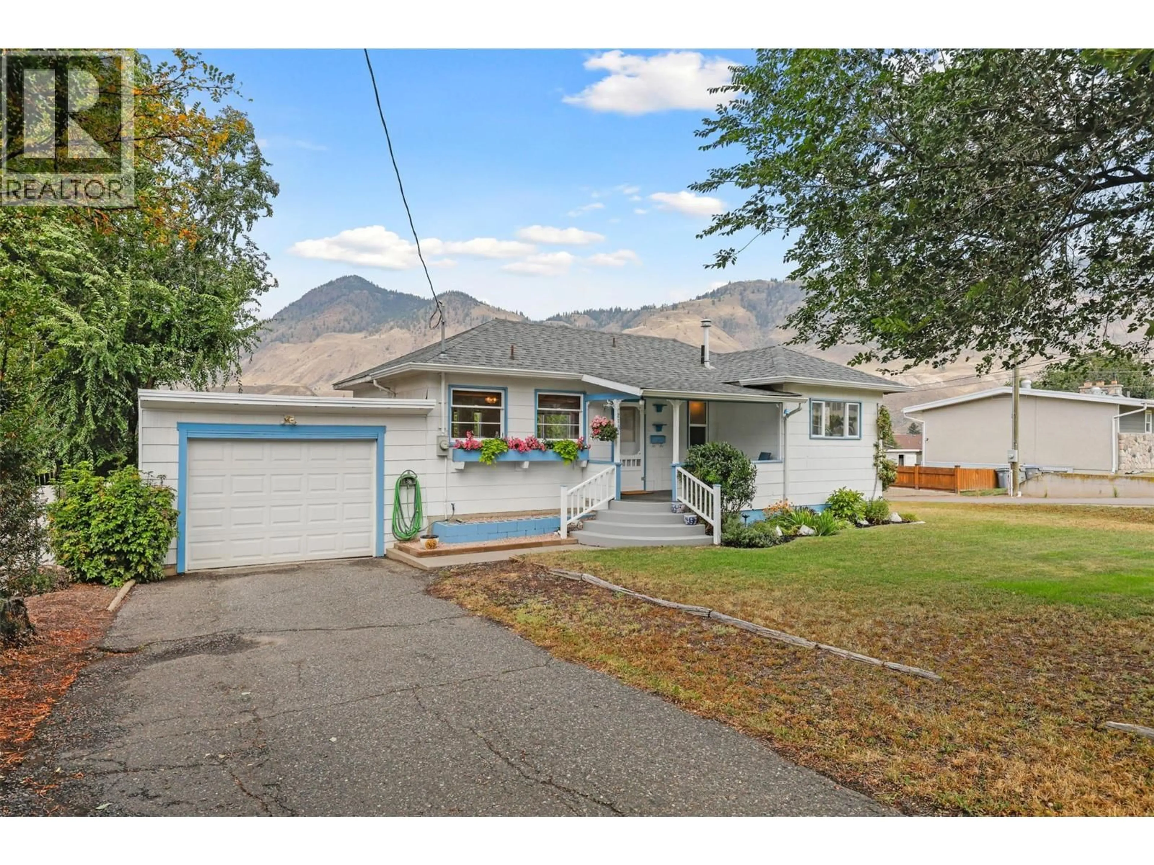 Home with vinyl exterior material, mountain view for 2152 CRESCENT DRIVE, Kamloops British Columbia V2C4J5