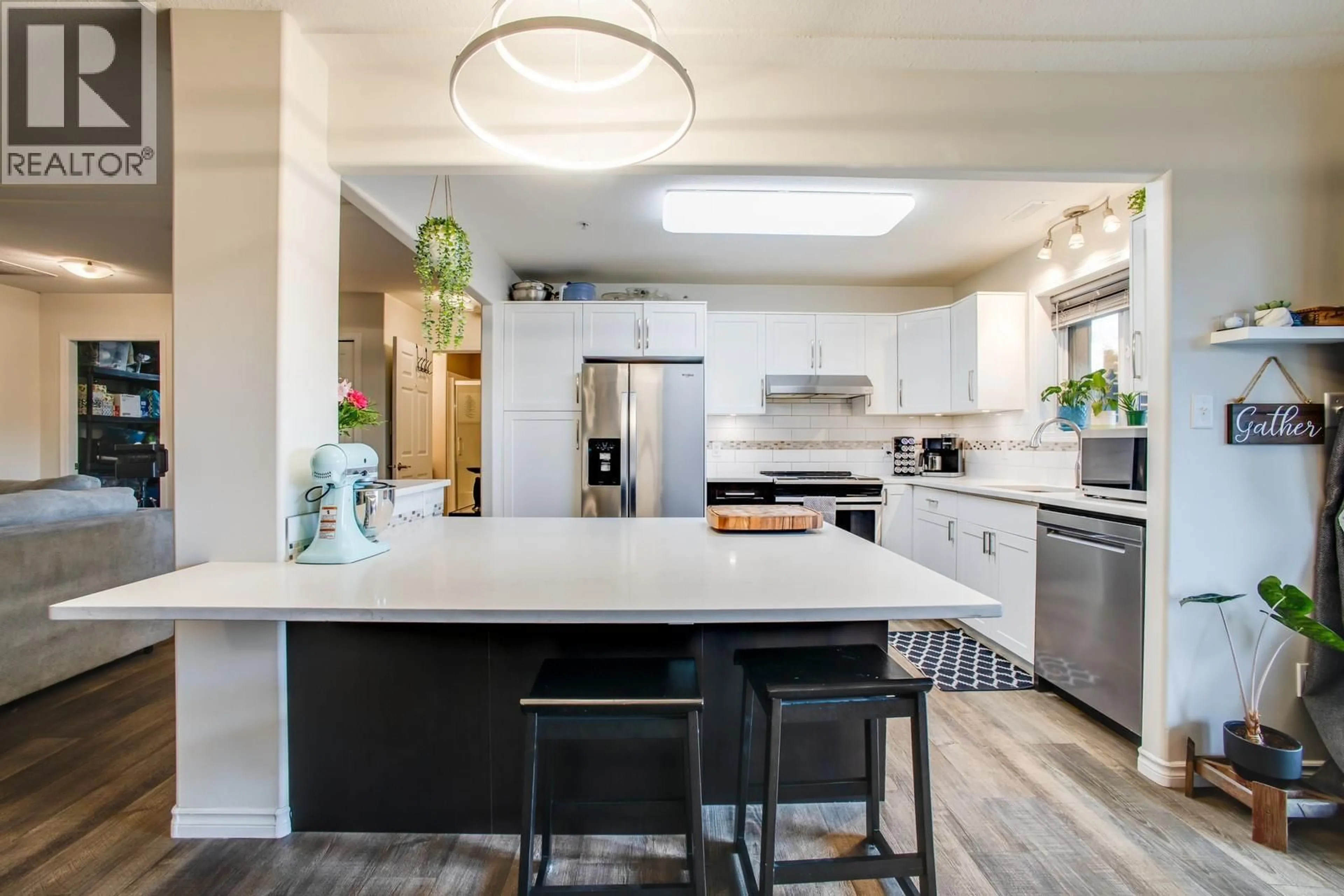 Open concept kitchen, ceramic/tile floor for 104 - 1966 DURNIN ROAD, Kelowna British Columbia V1X7Z2