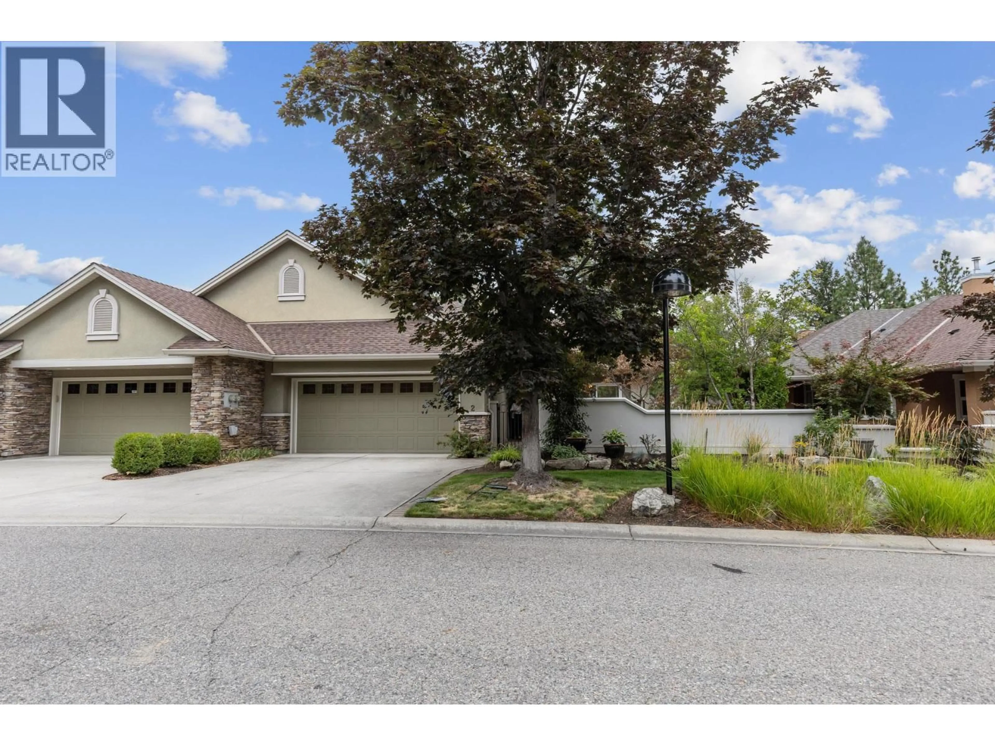 A pic from outside/outdoor area/front of a property/back of a property/a pic from drone, street for 2 - 4520 GALLAGHER'S LOOKOUT, Kelowna British Columbia V1W3Z8