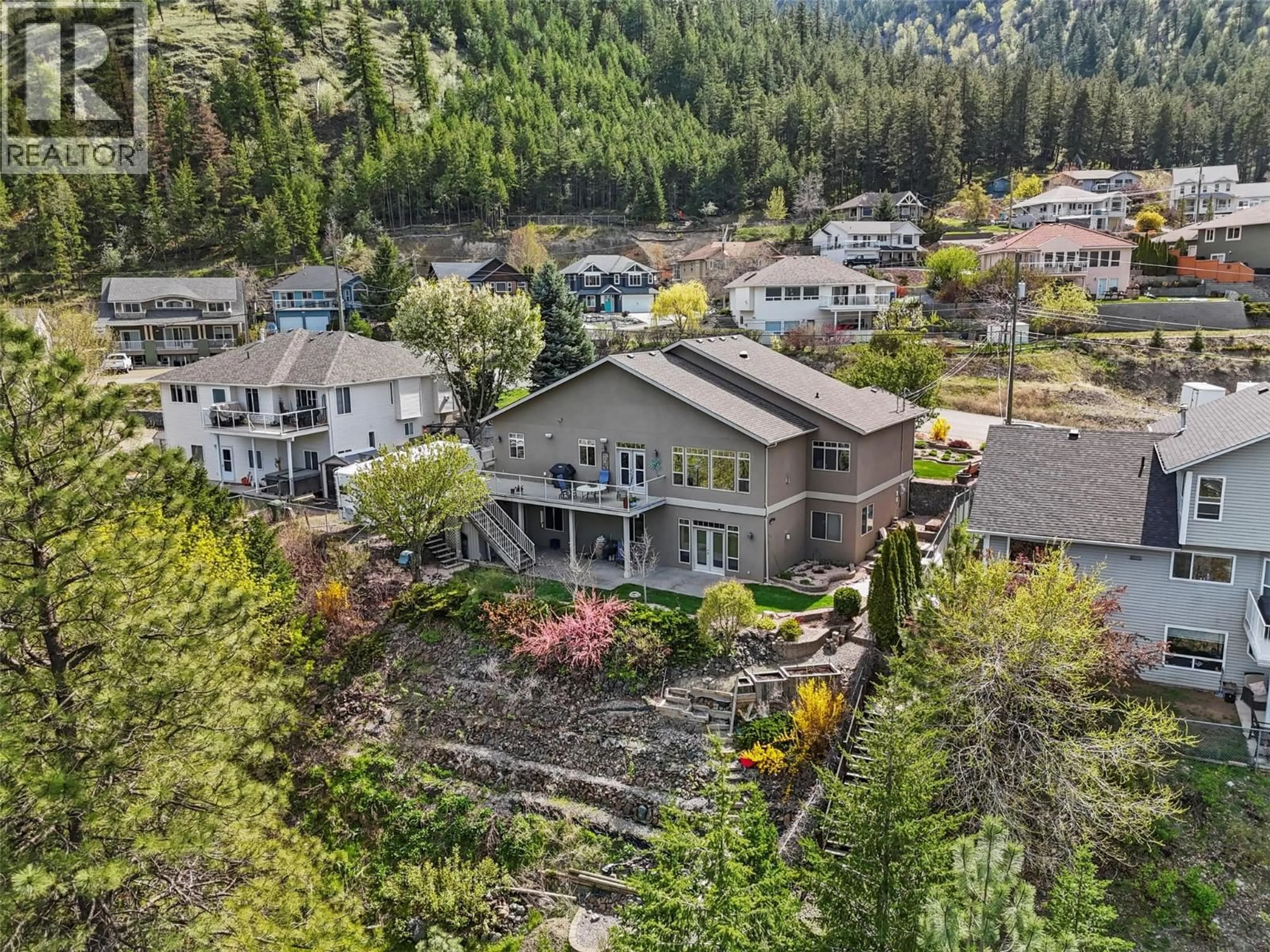 A pic from outside/outdoor area/front of a property/back of a property/a pic from drone, mountain view for 4767 UPLANDS DRIVE, Kamloops British Columbia V2C6S9