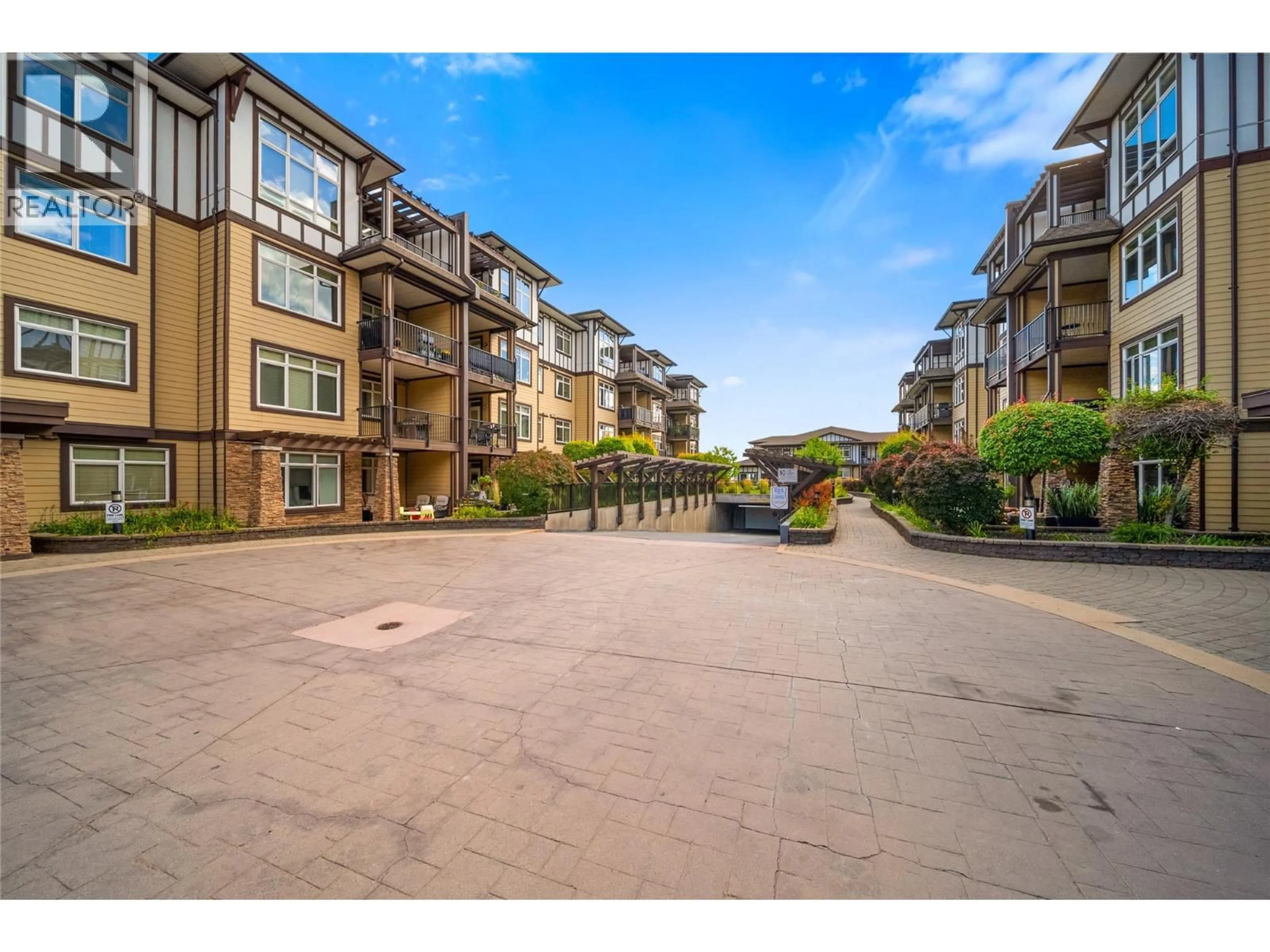 A pic from outside/outdoor area/front of a property/back of a property/a pic from drone, water/lake/river/ocean view for 2107 - 3843 BROWN ROAD, West Kelowna British Columbia V4T2J3