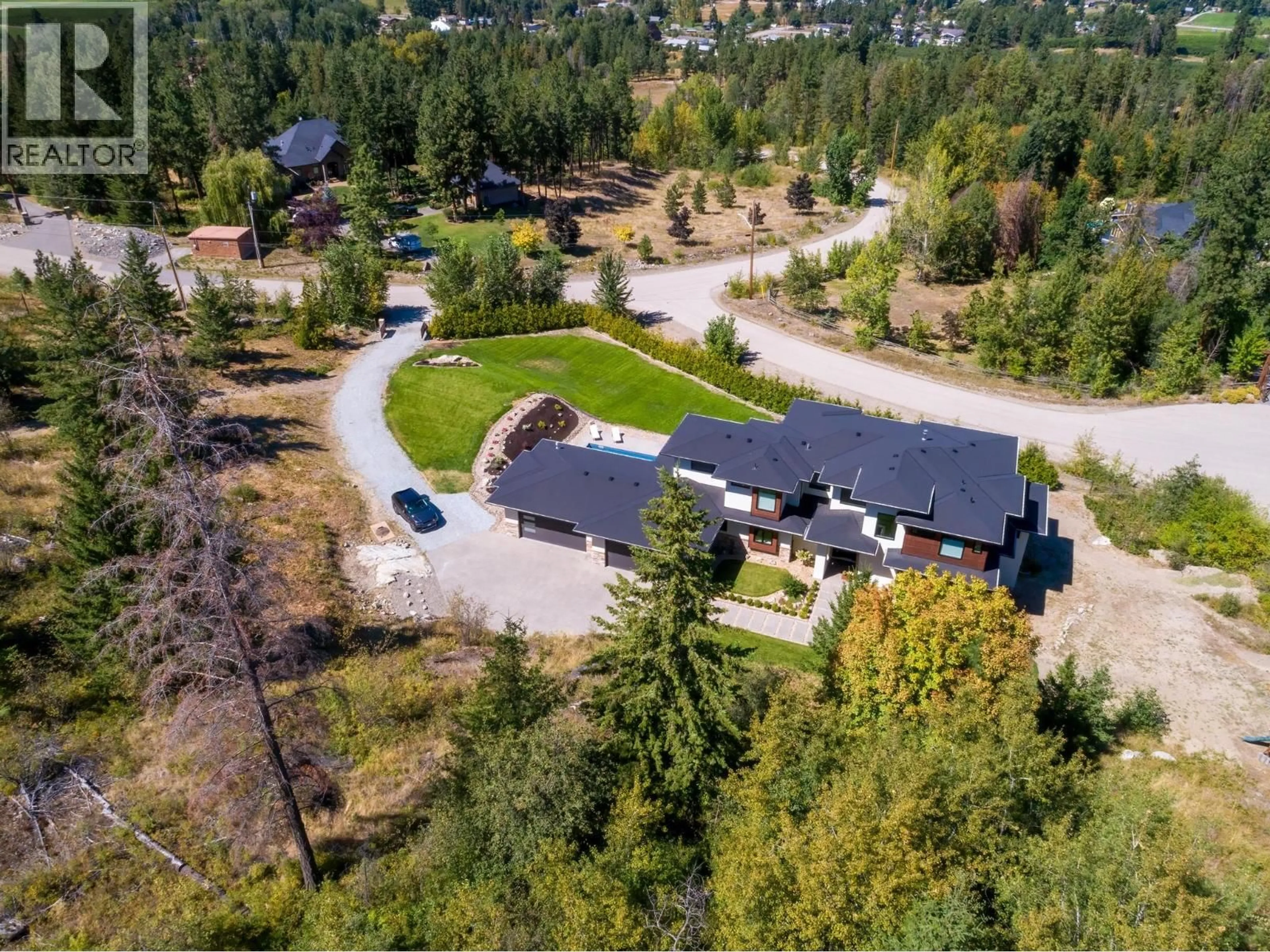 A pic from outside/outdoor area/front of a property/back of a property/a pic from drone, unknown for 4451 HAYES ROAD, Kelowna British Columbia V1W5A7