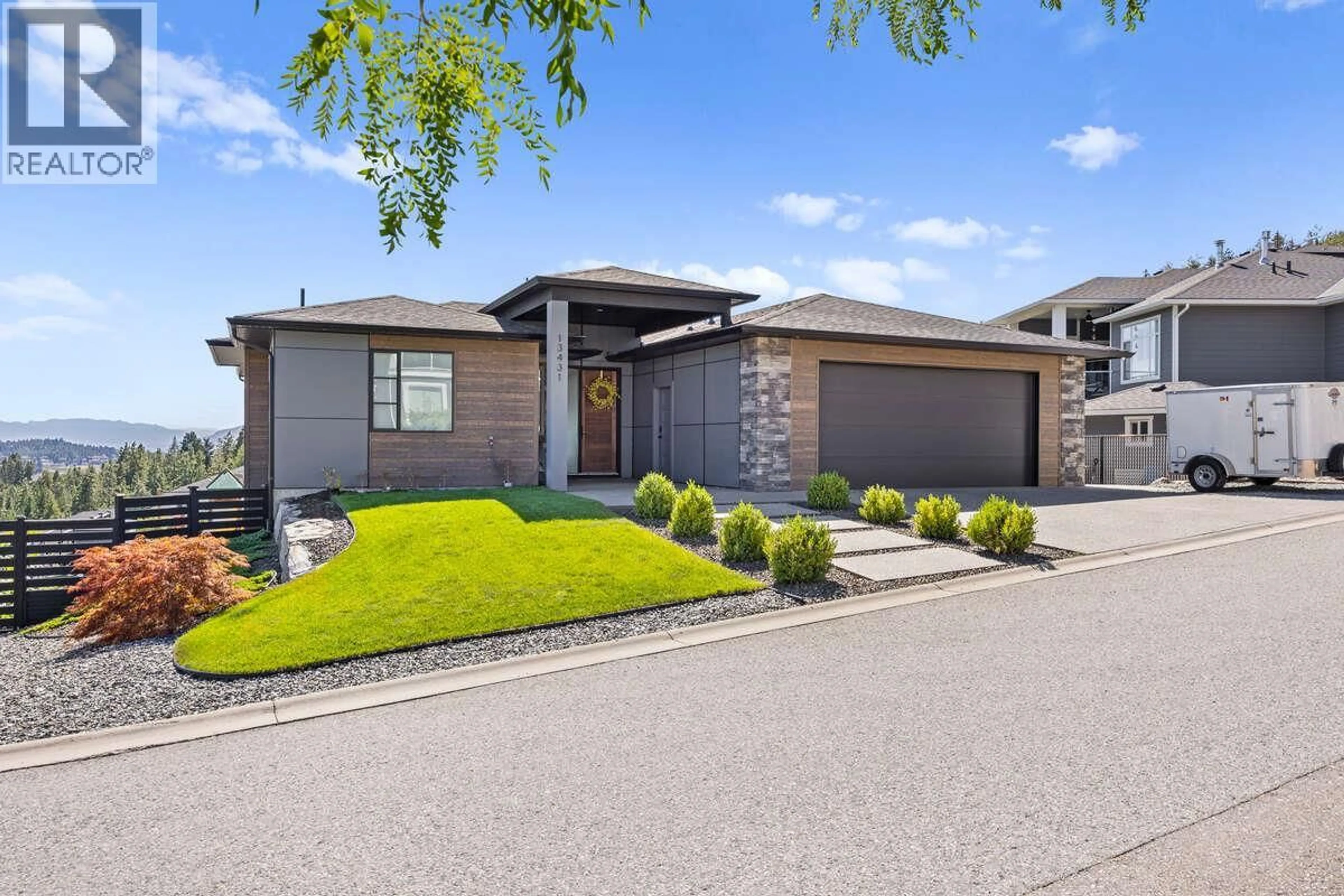 Home with brick exterior material, street for 13431 APEX LANE, Lake Country British Columbia V4V2W3
