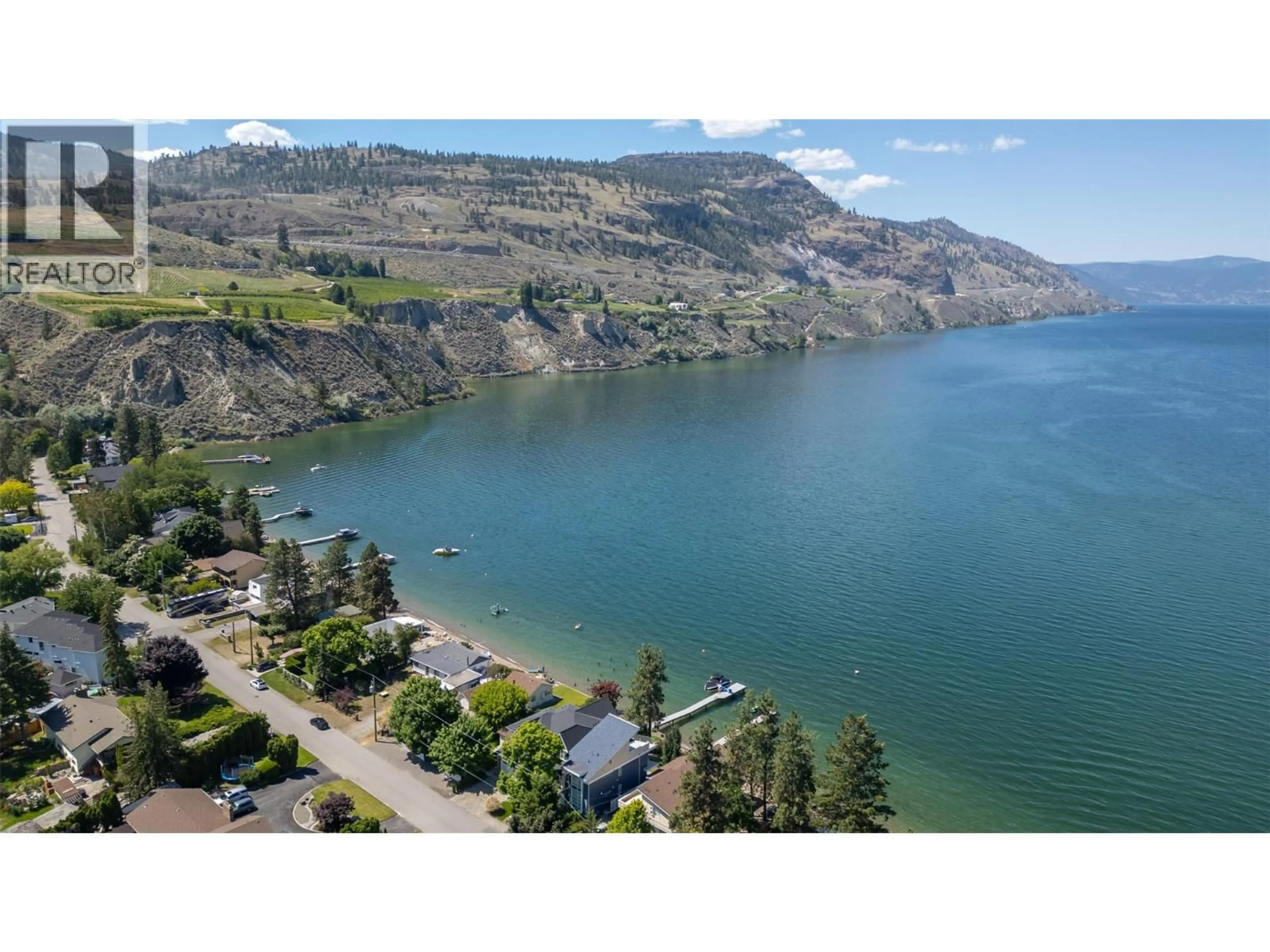A pic from outside/outdoor area/front of a property/back of a property/a pic from drone, water/lake/river/ocean view for 19235 LAKESHORE DRIVE NORTH, Summerland British Columbia V0H1Z6