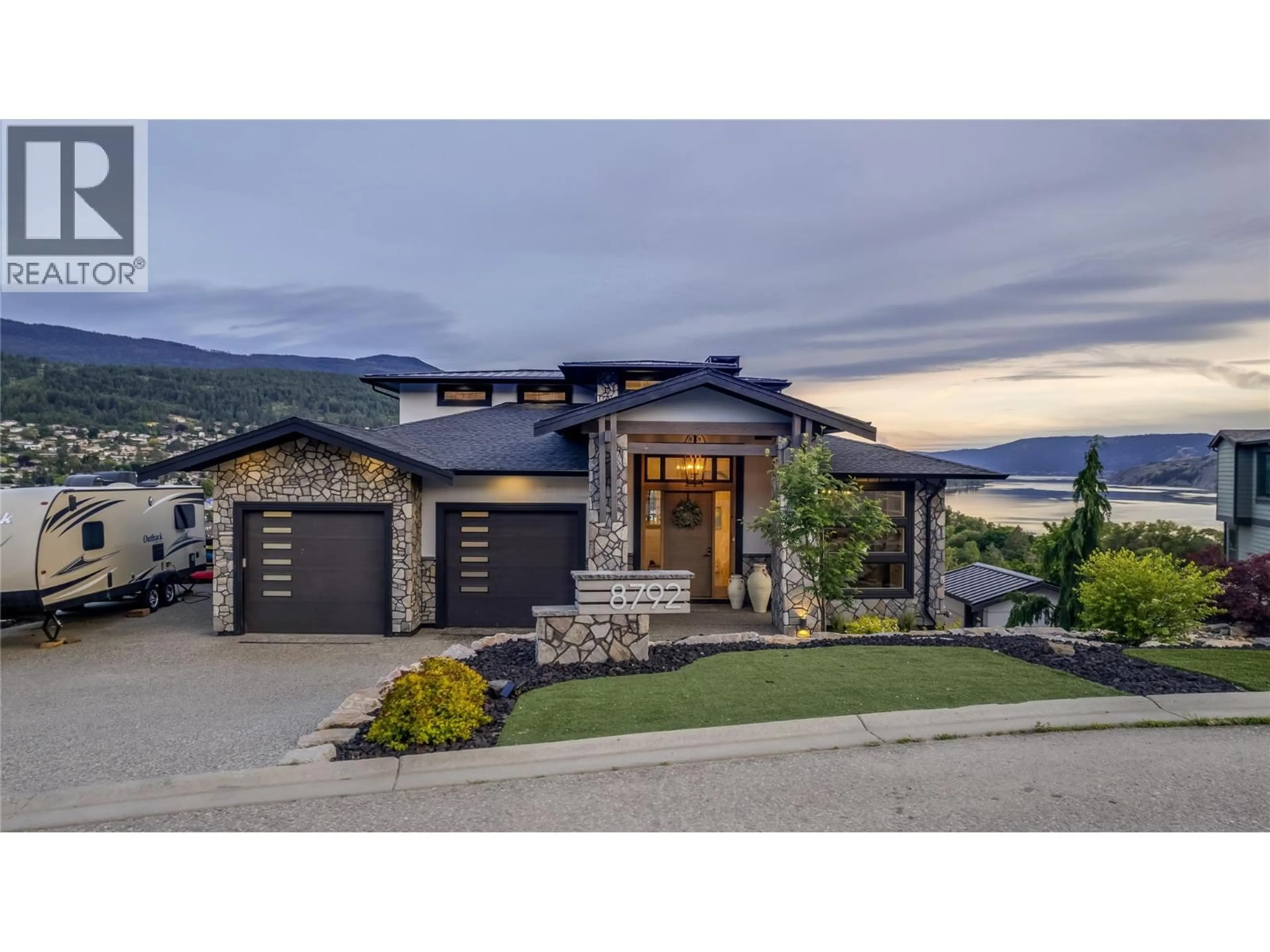 Home with brick exterior material, mountain view for 8792 CORTLAND PLACE, Coldstream British Columbia V1B4B8