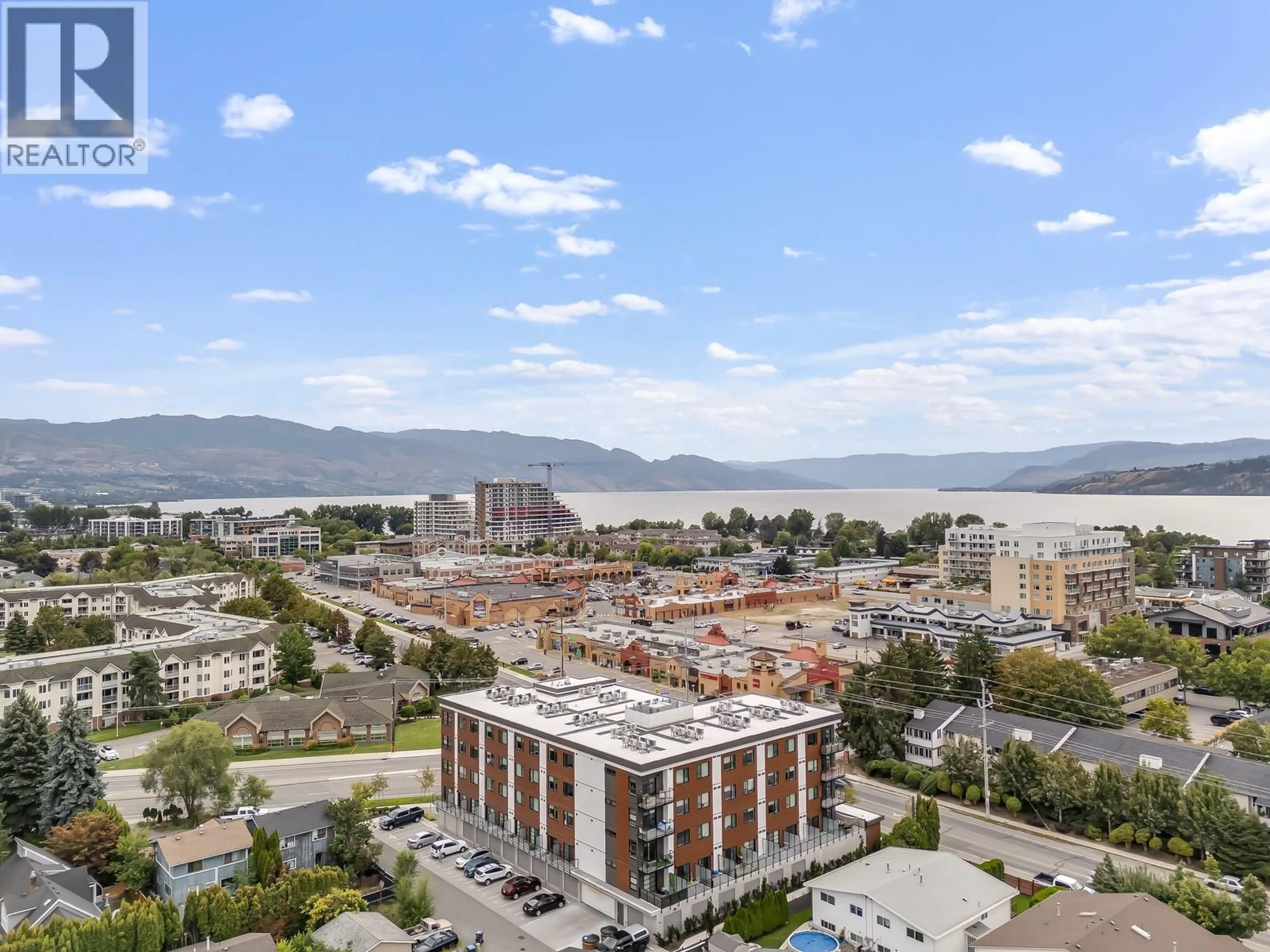 A pic from outside/outdoor area/front of a property/back of a property/a pic from drone, mountain view for 401 - 720 KLO ROAD, Kelowna British Columbia V1Y4X5
