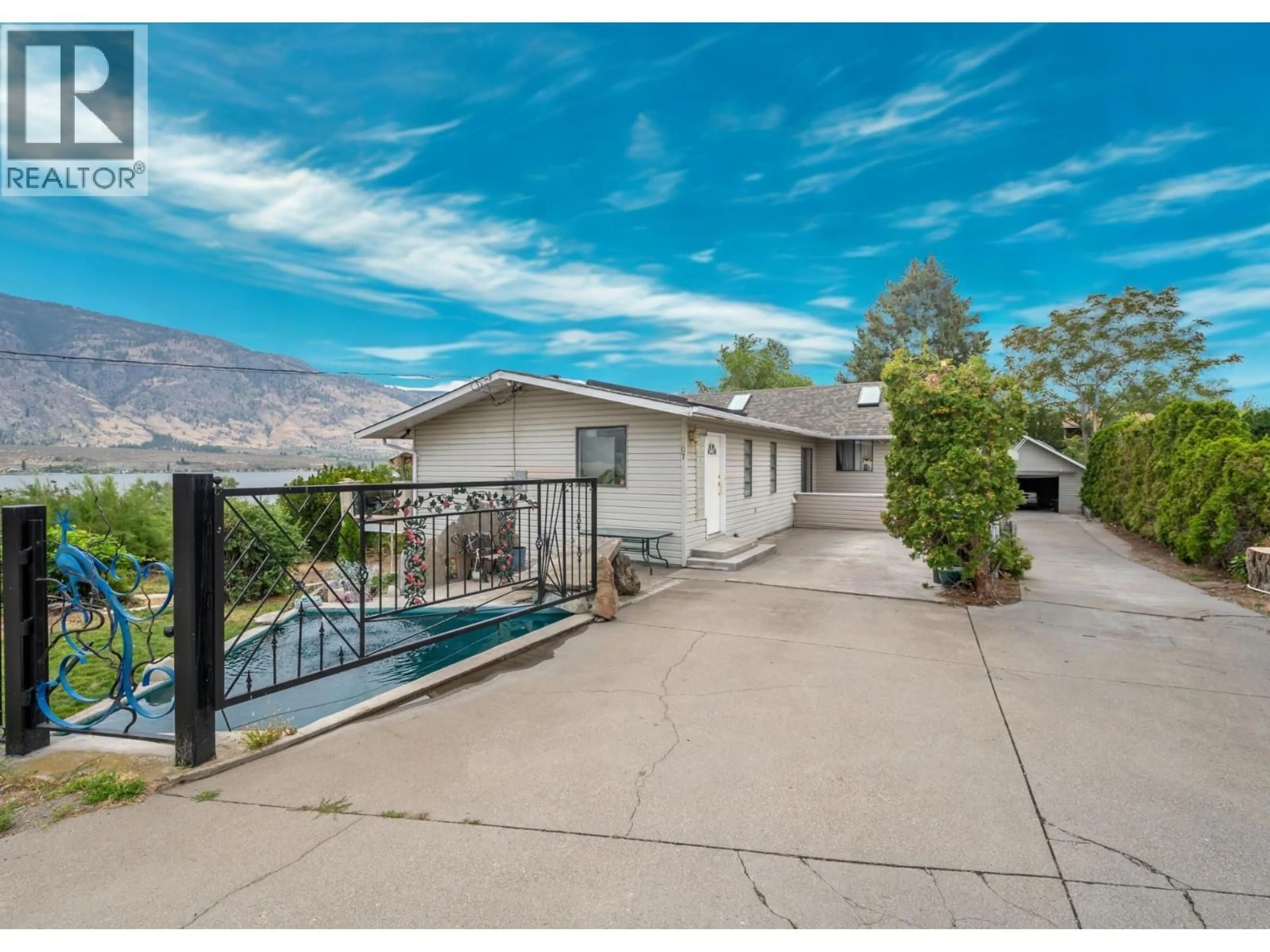 A pic from outside/outdoor area/front of a property/back of a property/a pic from drone, water/lake/river/ocean view for 8507 92ND AVENUE, Osoyoos British Columbia V0H1V2
