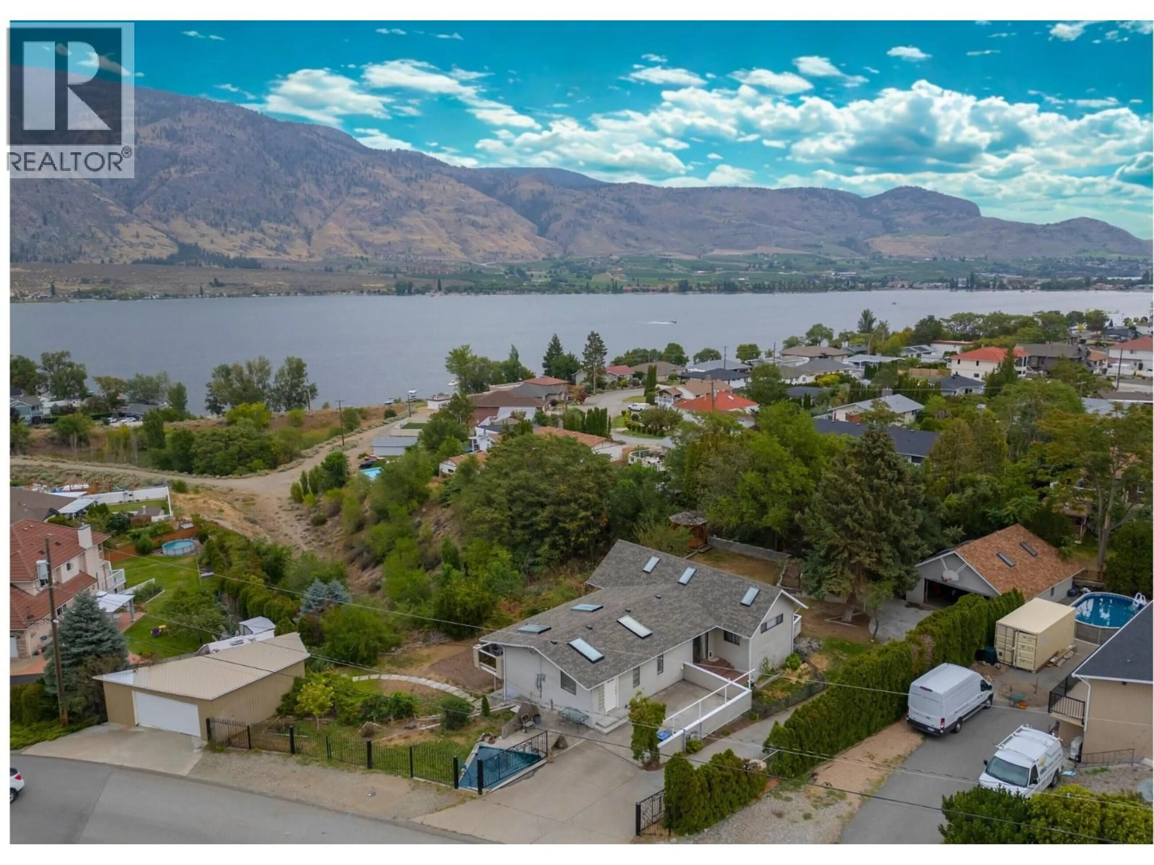 A pic from outside/outdoor area/front of a property/back of a property/a pic from drone, water/lake/river/ocean view for 8507 92ND AVENUE, Osoyoos British Columbia V0H1V2