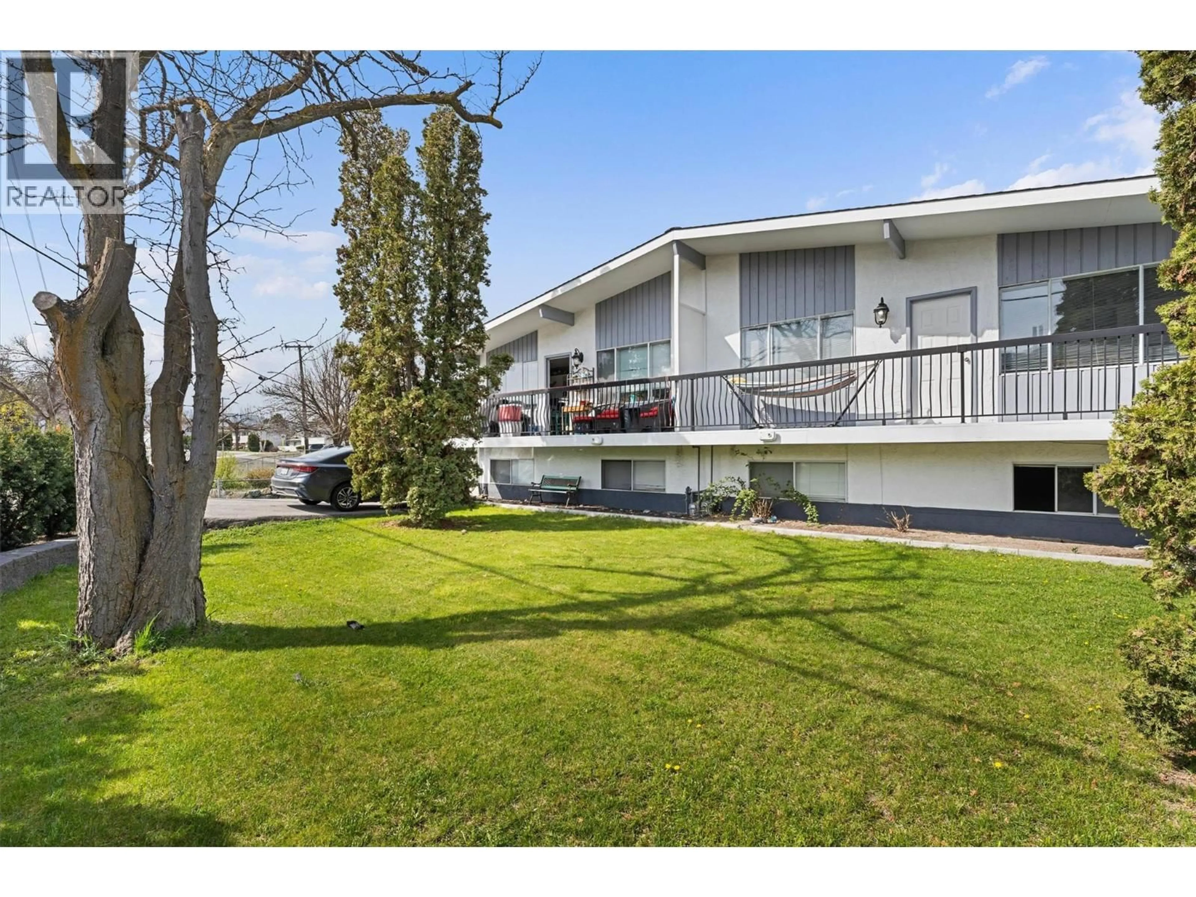 A pic from outside/outdoor area/front of a property/back of a property/a pic from drone, unknown for 600/602 RUTLAND ROAD SOUTH, Kelowna British Columbia V1X3A3