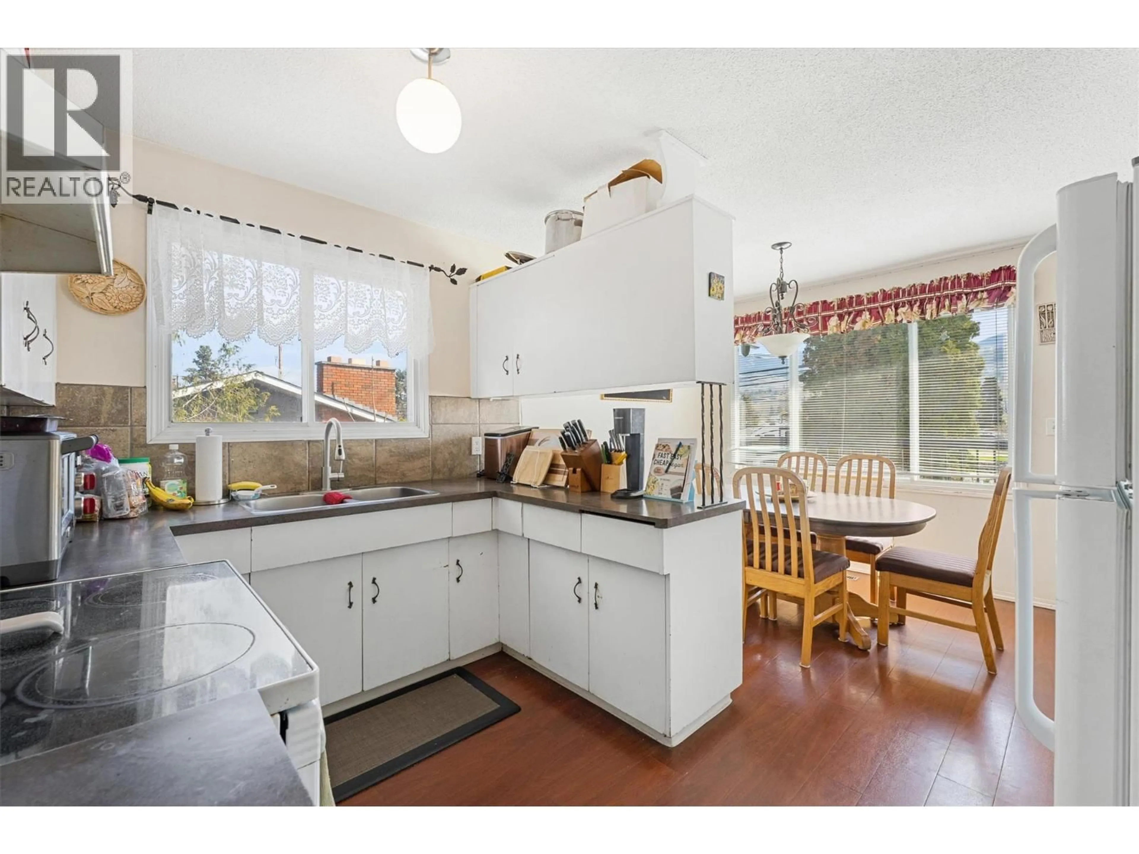 Standard kitchen, ceramic/tile floor for 600/602 RUTLAND ROAD SOUTH, Kelowna British Columbia V1X3A3