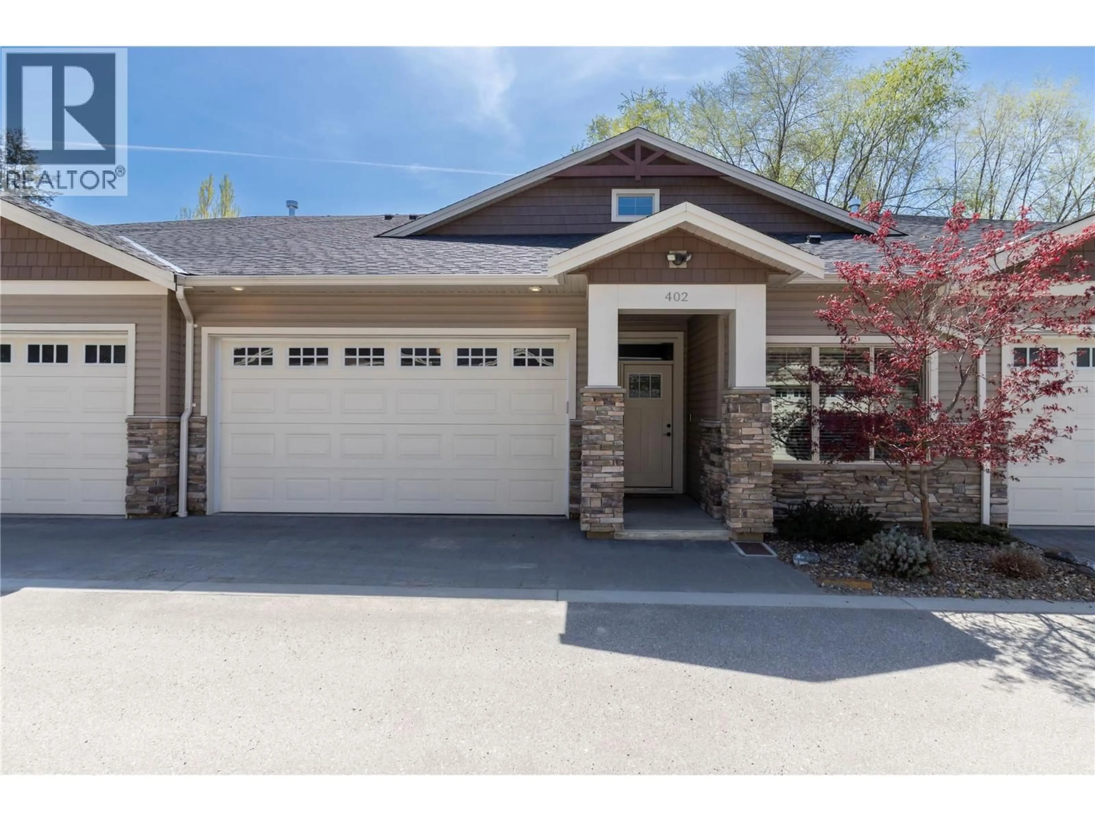 Home with vinyl exterior material, street for 402 - 9563 JENSEN ROAD, Lake Country British Columbia V4V1S6