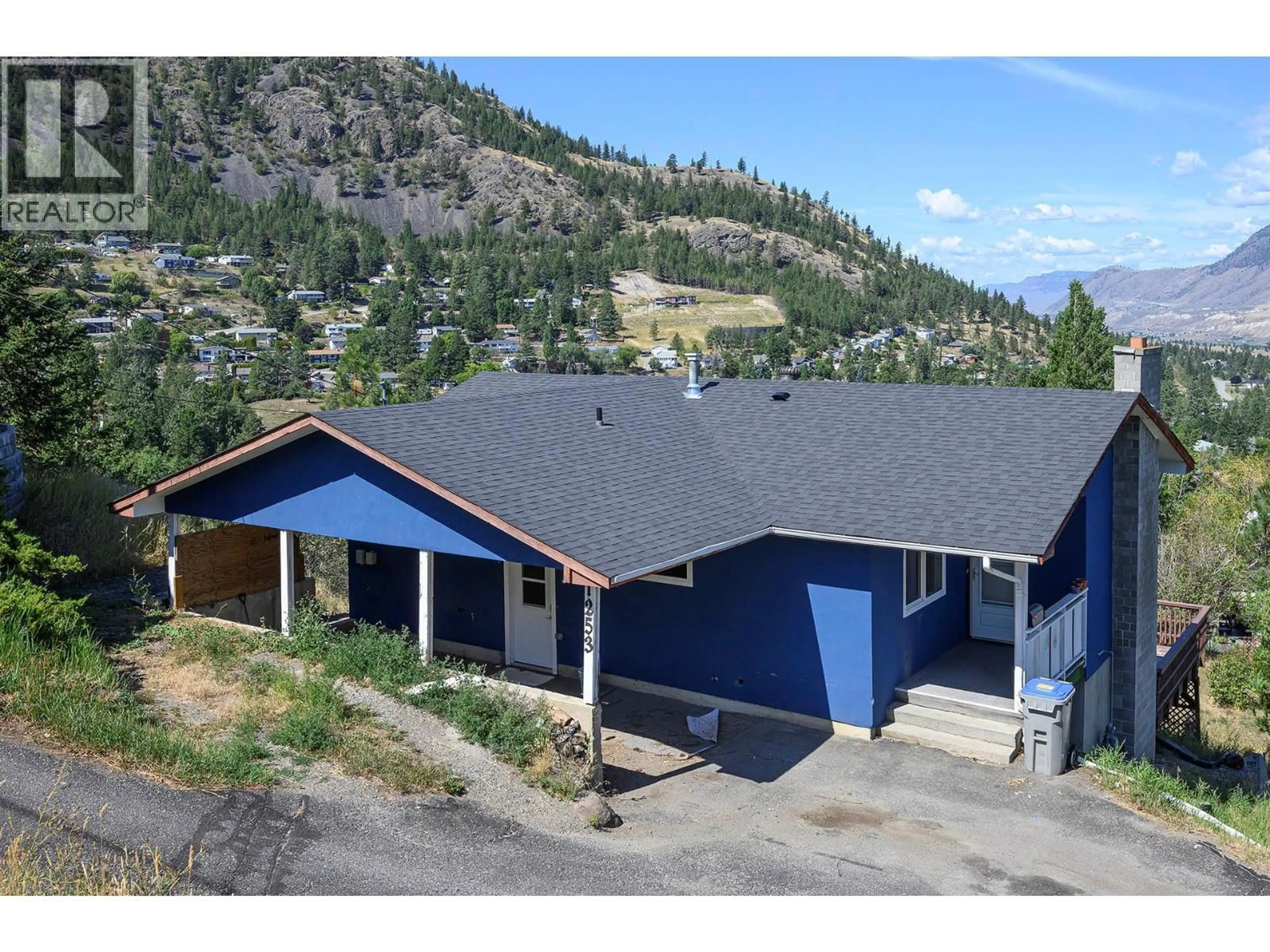 A pic from outside/outdoor area/front of a property/back of a property/a pic from drone, mountain view for 1253 HIGHRIDGE DRIVE, Kamloops British Columbia V2C5G5